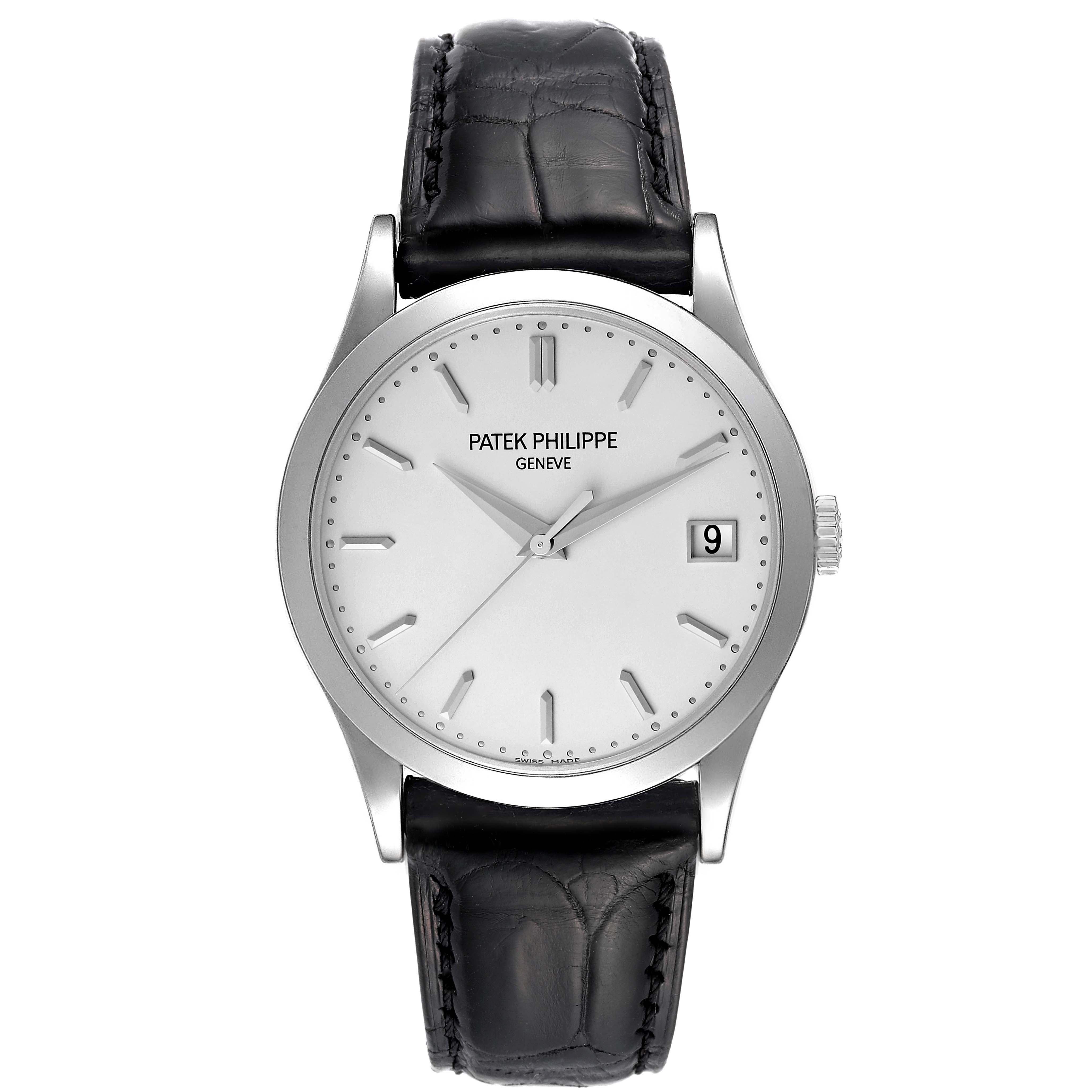 The image shows a front view of the Patek Philippe Calatrava 5296G-010 Men
s White Gold Silver Dial 5296G-010 Men
s White Gold Silver Dial watch, highlighting its dial, hands, date window, and leather strap.