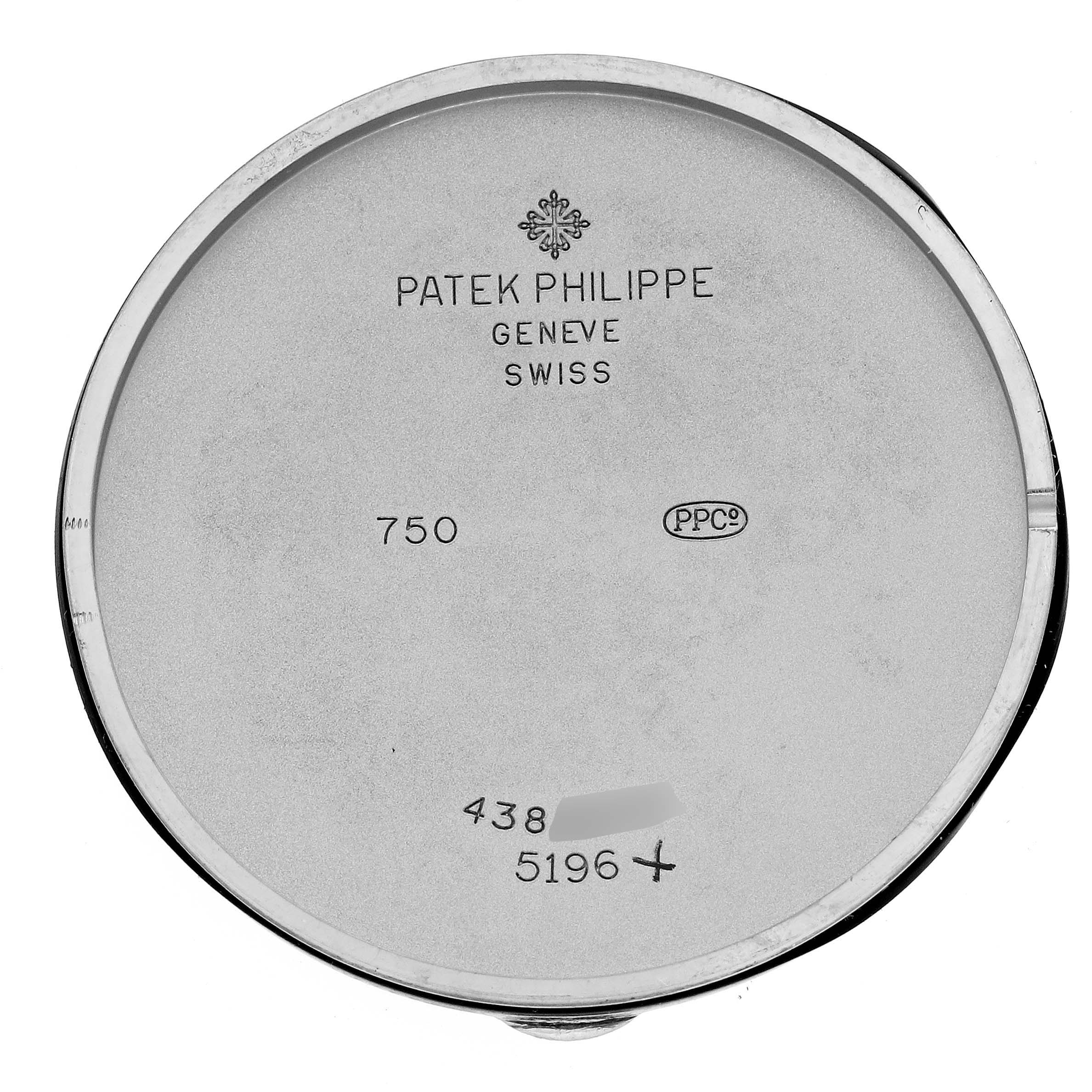 This image shows the interior of the back cover of a Patek Philippe Calatrava 5196G Men
s White Gold Silver Dial 5196G Men
s White Gold Silver Dial watch, highlighting the engravings.