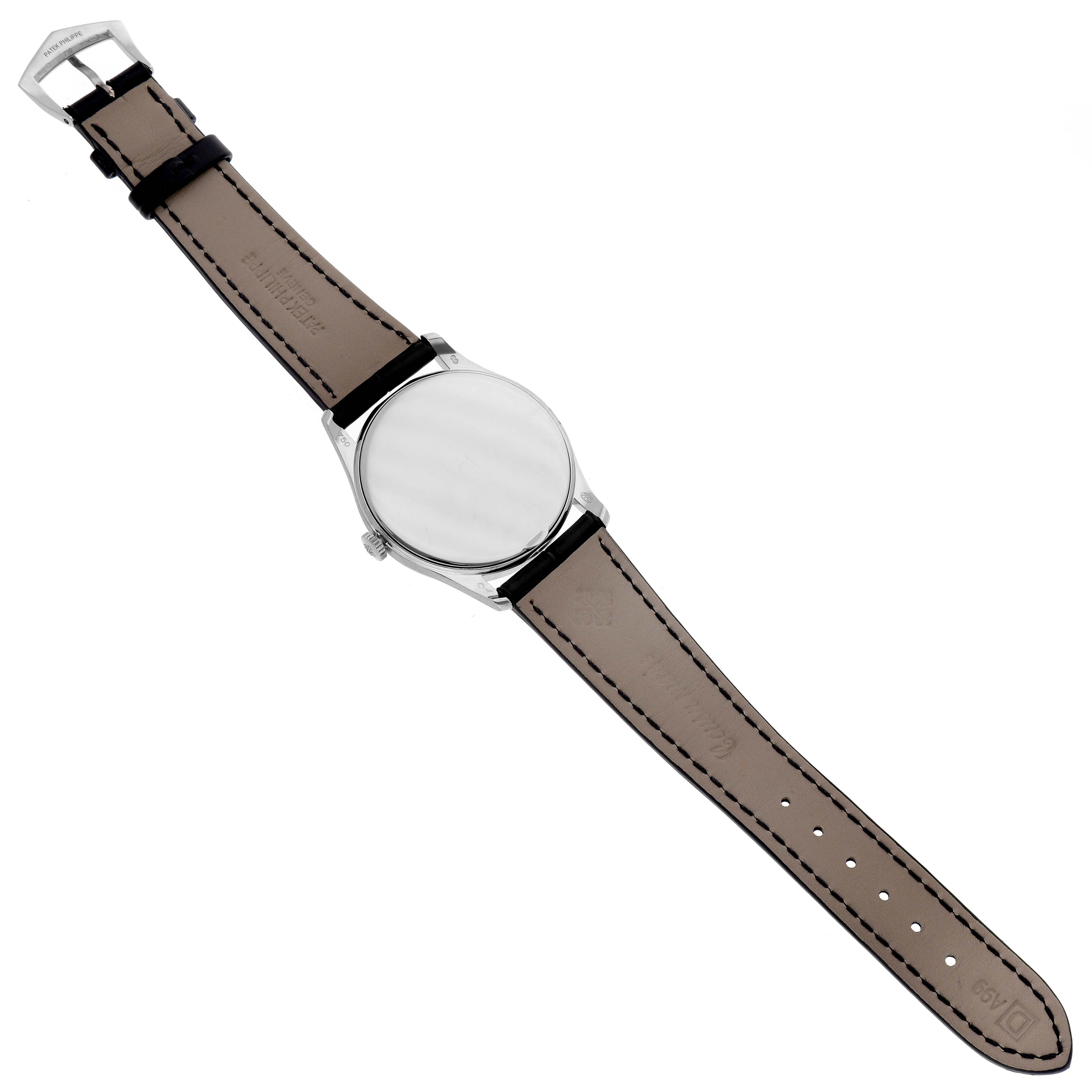 This image shows the back view of a Patek Philippe Calatrava 5196G Men
s White Gold Silver Dial 5196G Men
s White Gold Silver Dial watch, displaying the leather strap, buckle, and case back.