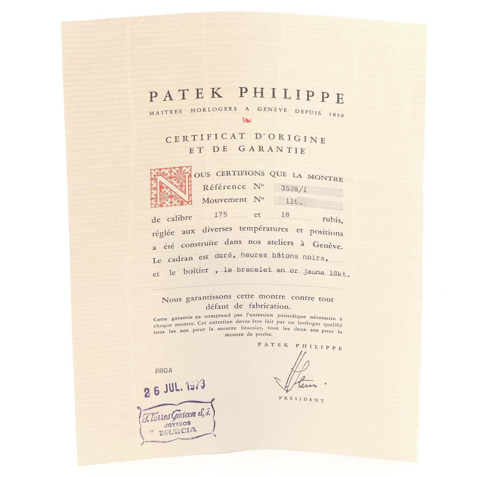 This image shows the original certificate of guarantee for a vintage Patek Philippe watch, providing details about the watch's specifications.