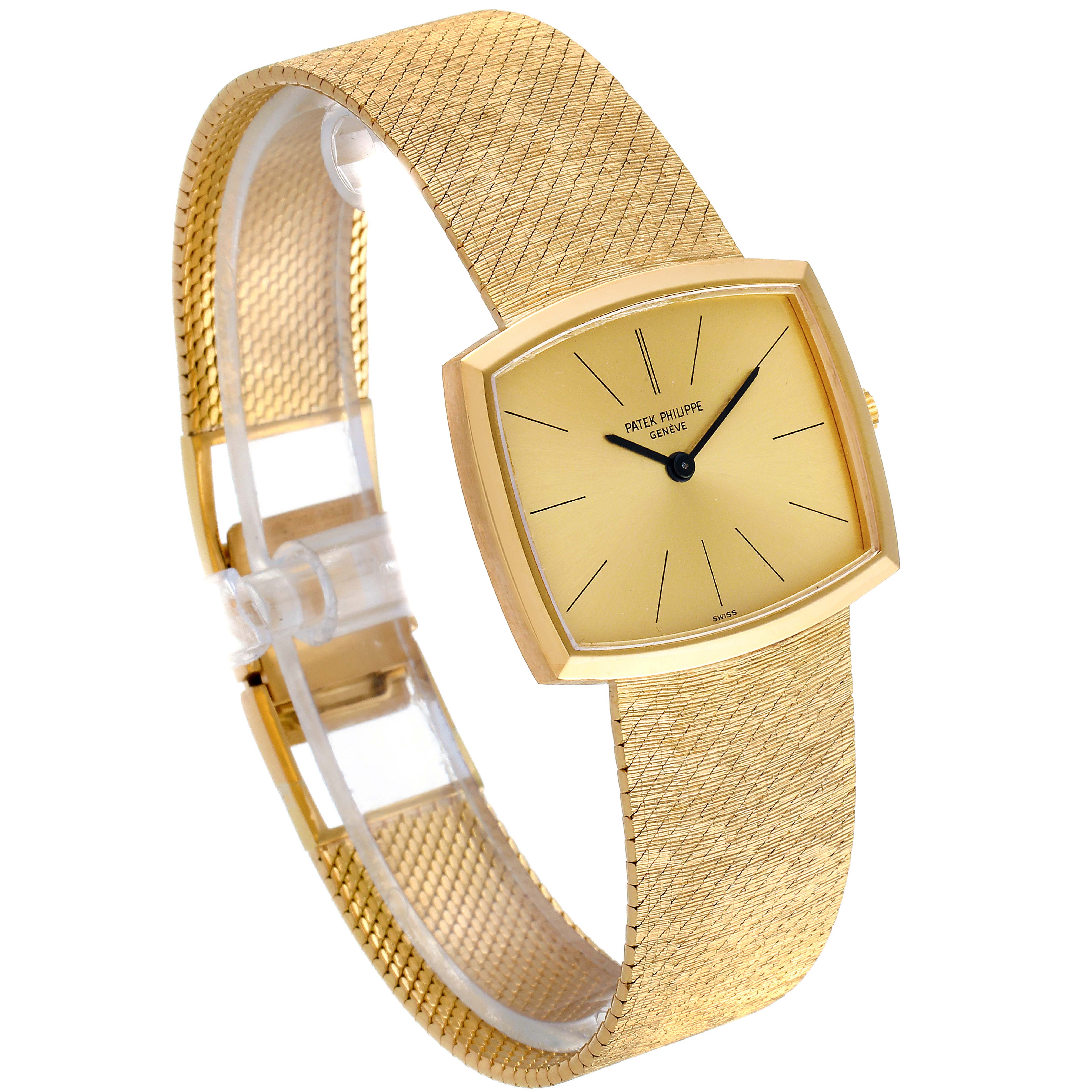 The image shows a Patek Philippe Vintage 3528/1 Men's Yellow Gold Champagne Dial 3528/1 Men's Yellow Gold Champagne Dial watch from a slightly elevated side angle, highlighting its gold mesh bracelet and golden rectangular dial.