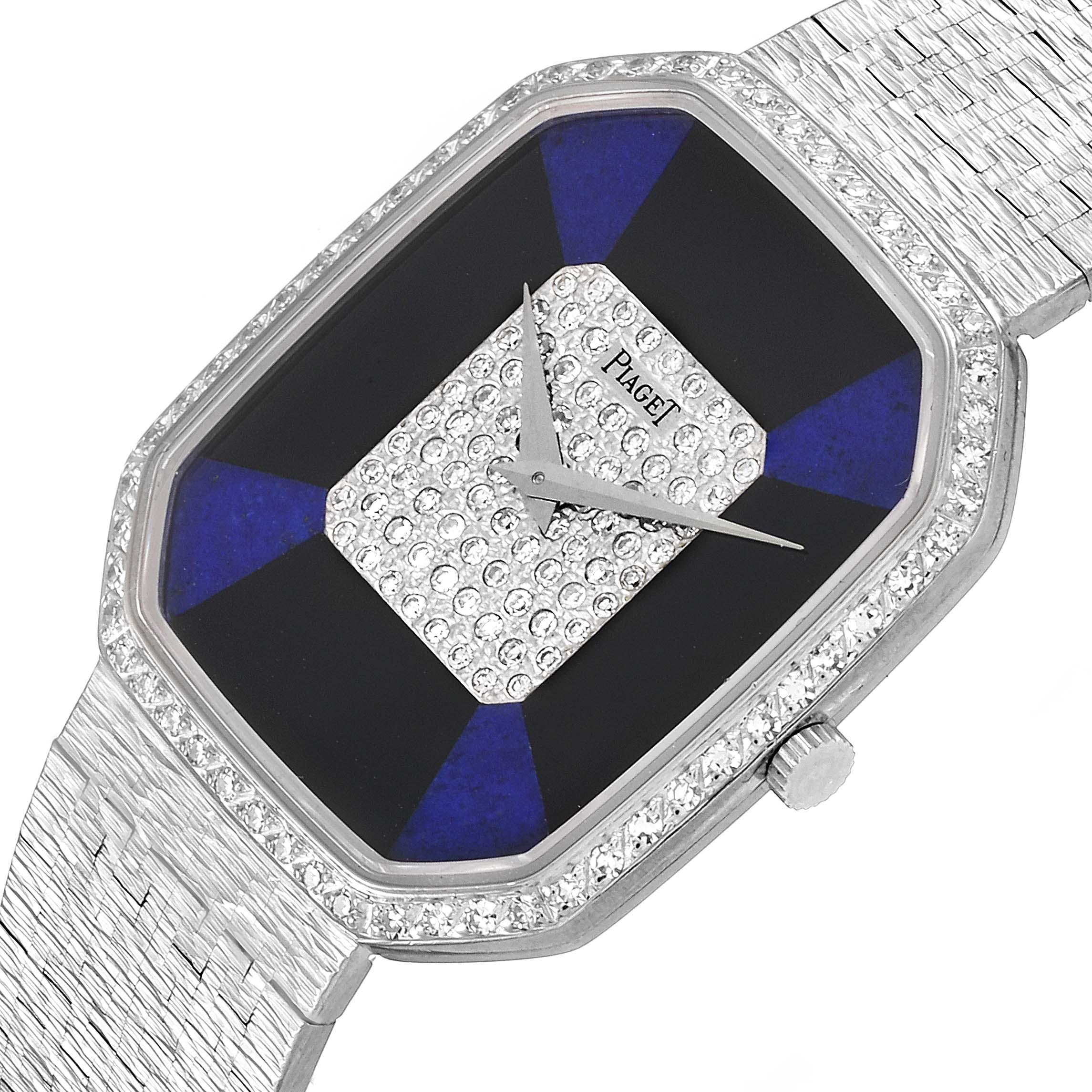 This Piaget 9795 Women
s White Gold Blue Dial 9795 Women
s White Gold Blue Dial 9795 White Gold Onyx Lapis Lazuli Dial Diamond Vintage Cocktail Watch is shown from a top-down angle, displaying its face and part of the strap.
