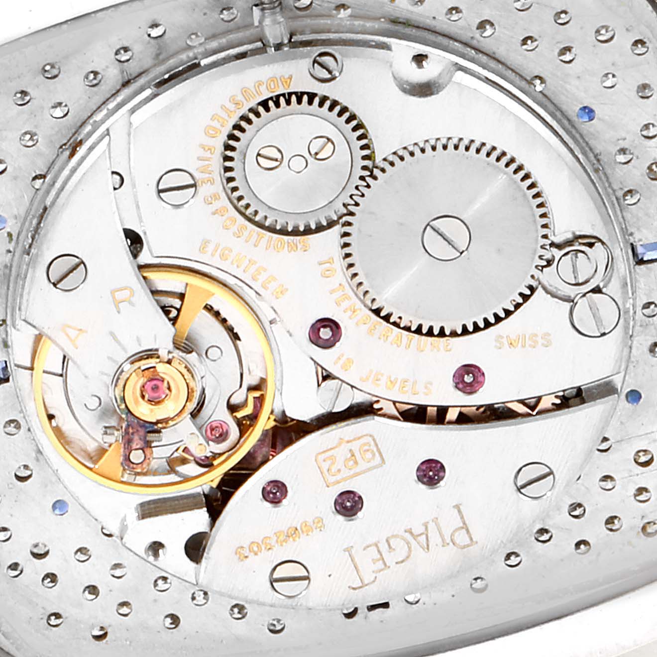 This is a close-up of the movement mechanism of the Piaget 9741 D23 Men's White Gold  9741 D23 Men's White Gold  9741 White Gold Pave Diamond Sapphire Dial Vintage Unisex Watch.