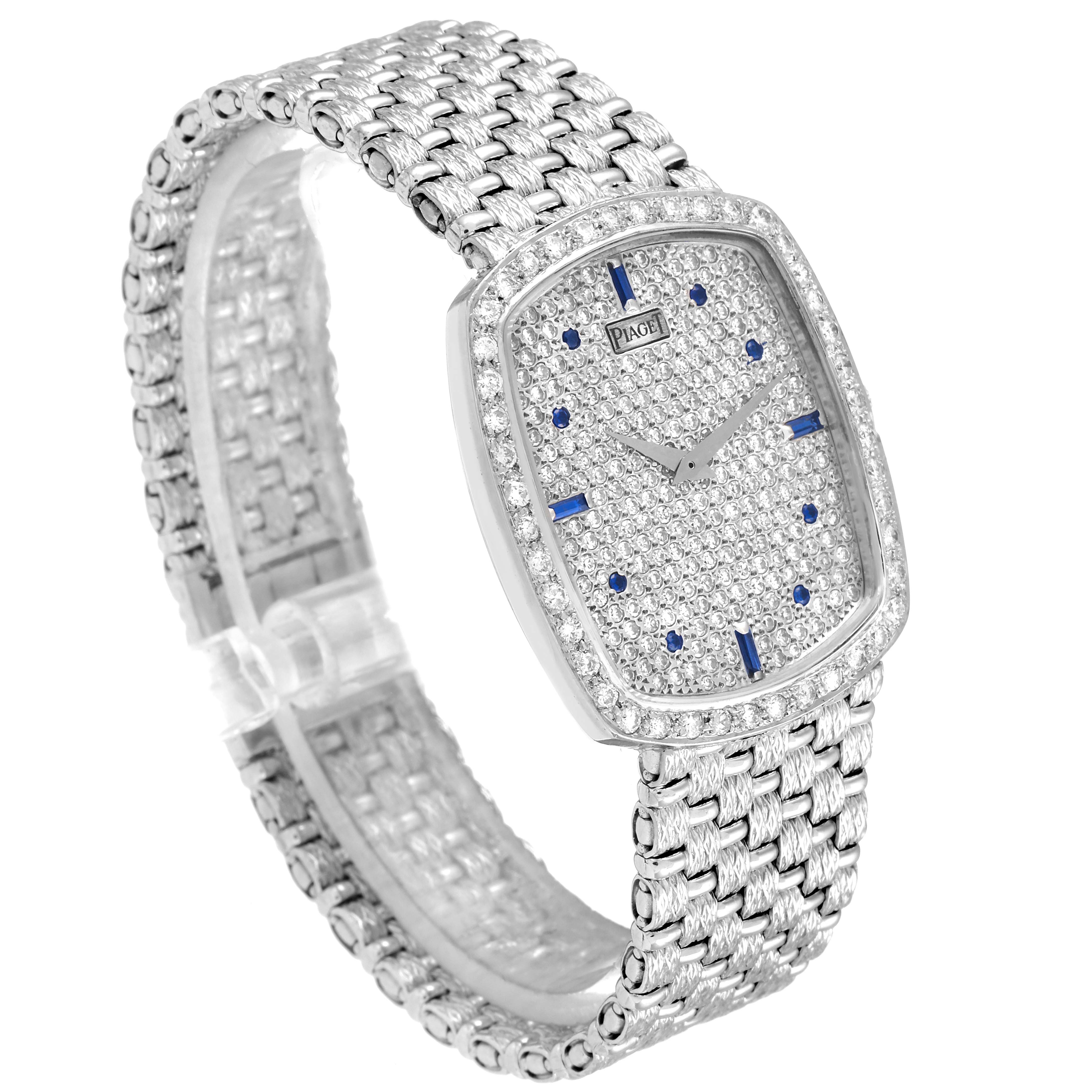 This image shows the full face and strap of the Piaget 9741 D23 Men's White Gold  9741 D23 Men's White Gold  9741 White Gold Pave Diamond Sapphire Dial Vintage Unisex Watch from a side angle.