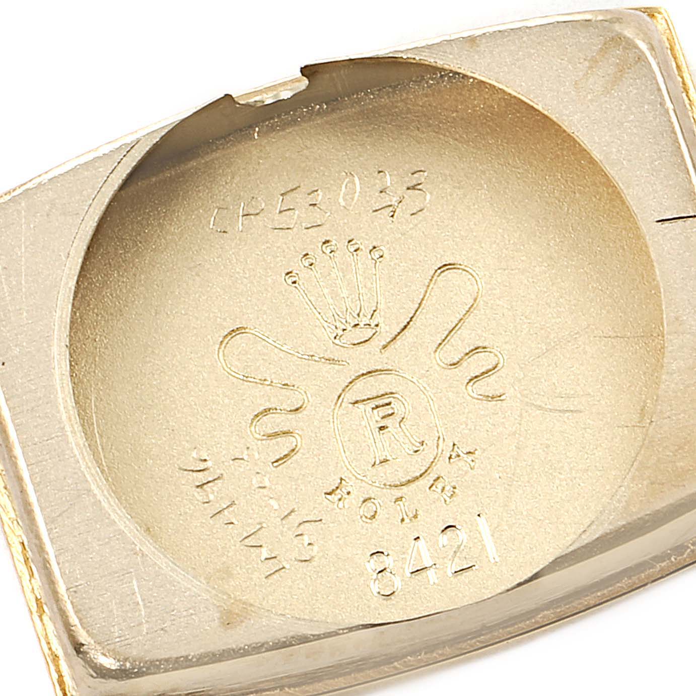This image shows the inner case back of the Rolex Cocktail  Women's Yellow Gold Champagne Dial  Women's Yellow Gold Champagne Dial model watch, displaying the Rolex logo and model number 8421.