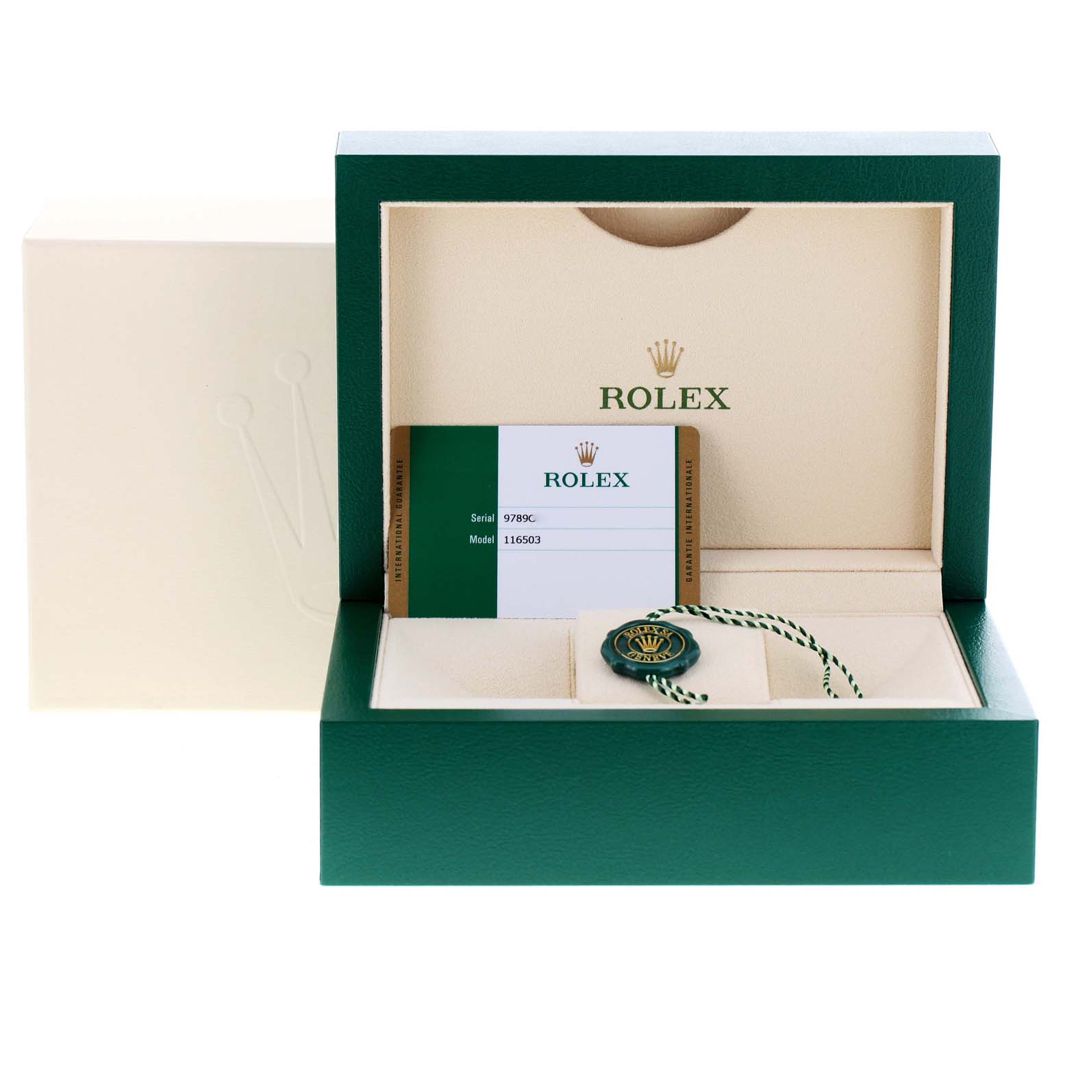 The image shows the box, warranty card, and tag of the Daytona model by Rolex.