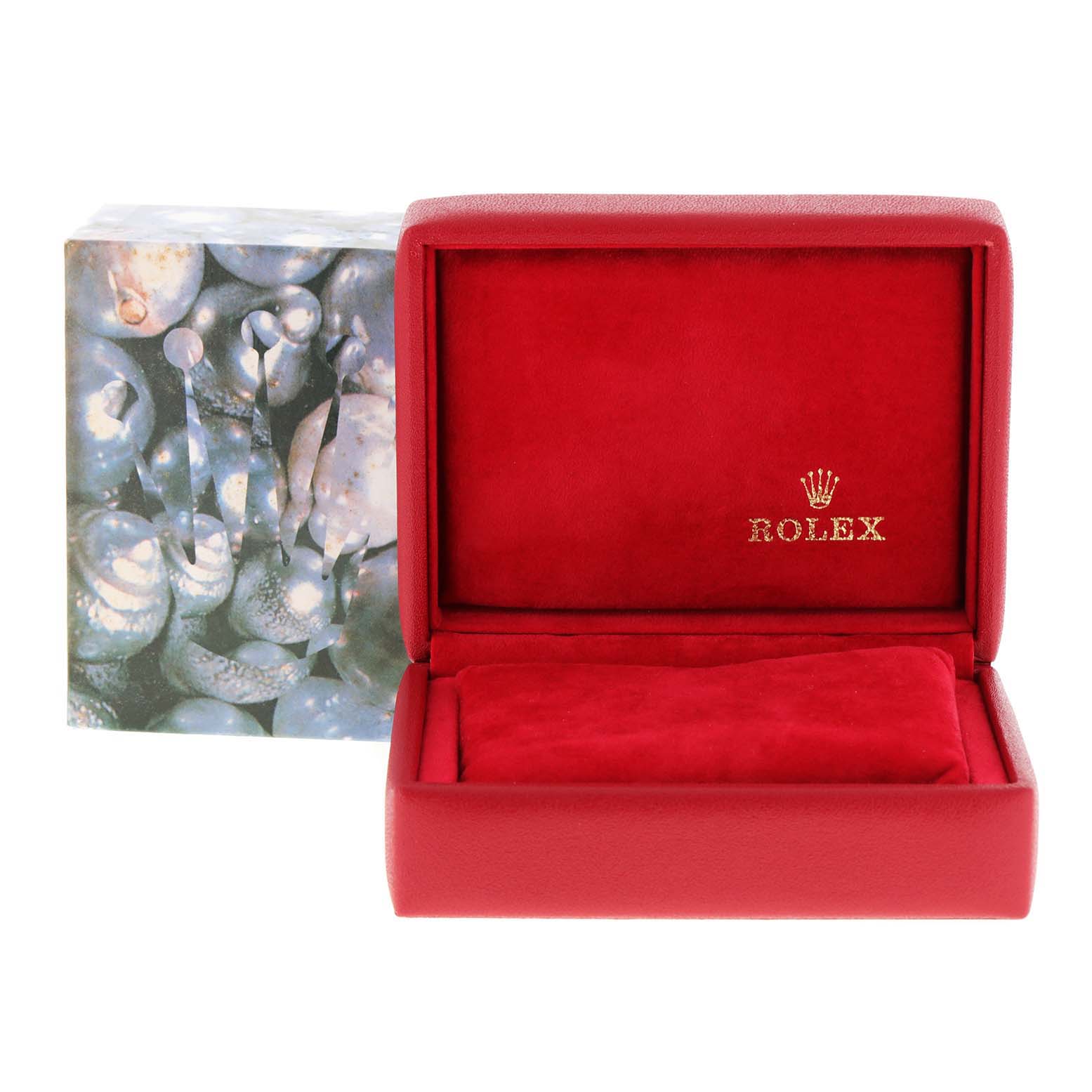The image shows an open, red Rolex watch box for the Date model with the logo inside, alongside its outer decorative box.