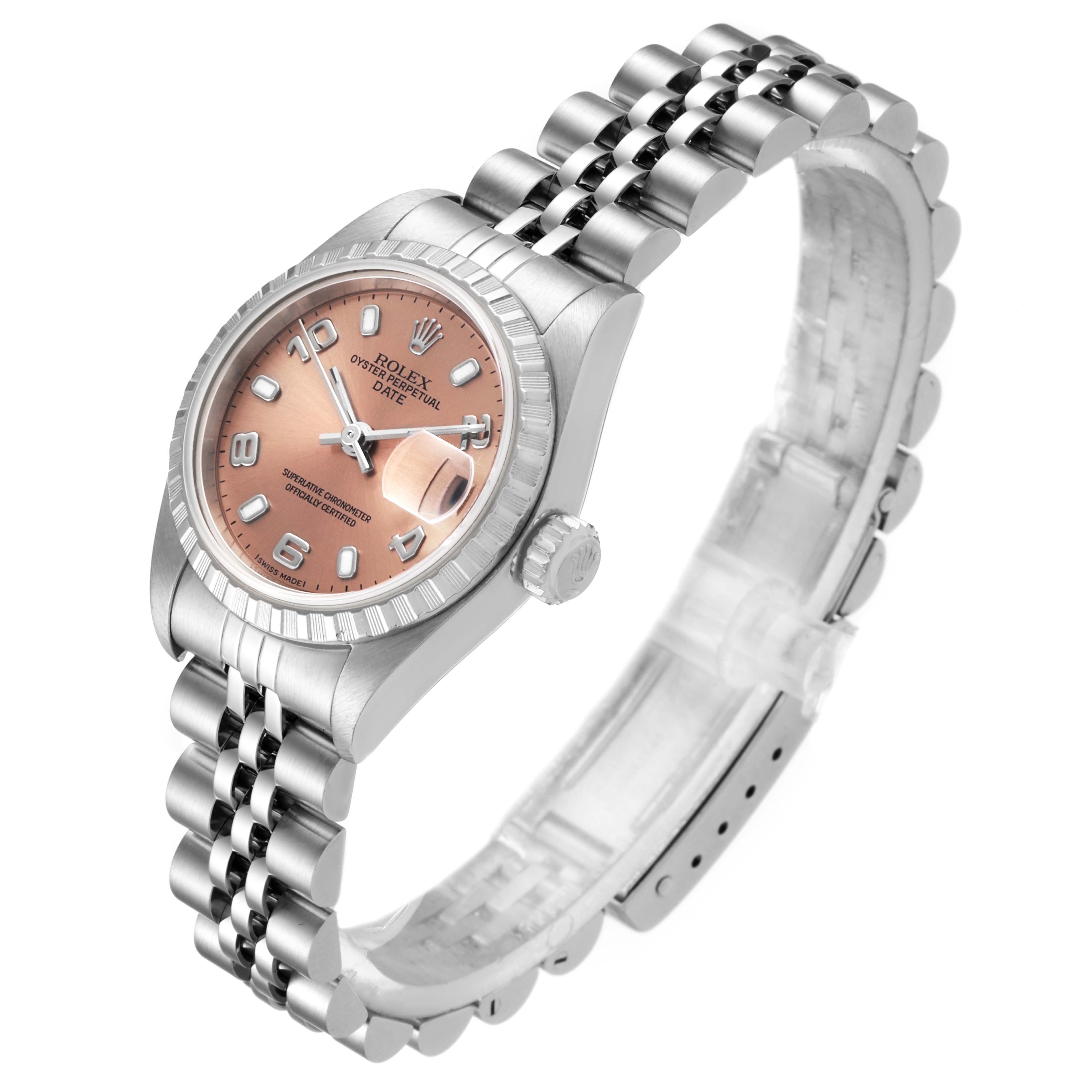 The Rolex Date 79240 Women's Stainless Steel Pink Dial 79240 Women's Stainless Steel Pink Dial model watch is shown at a tilted angle, displaying the face, bezel, crown, and bracelet.