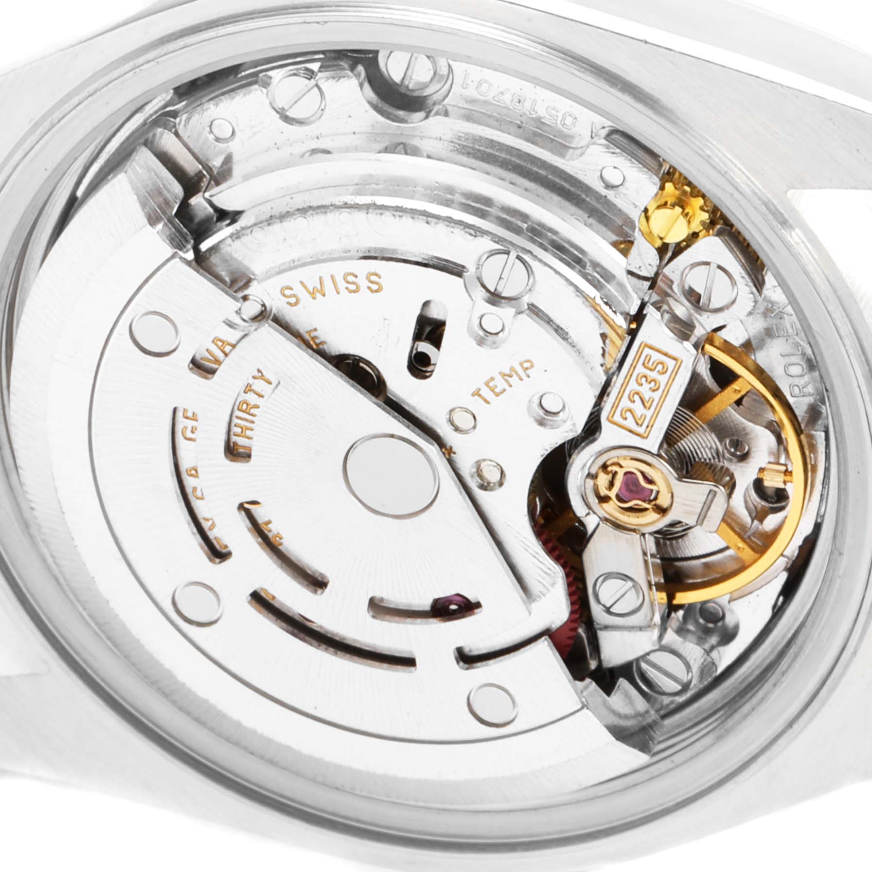 This image shows a close-up view of the movement of a Rolex Date 79240 Women's Stainless Steel Pink Dial 79240 Women's Stainless Steel Pink Dial model watch.