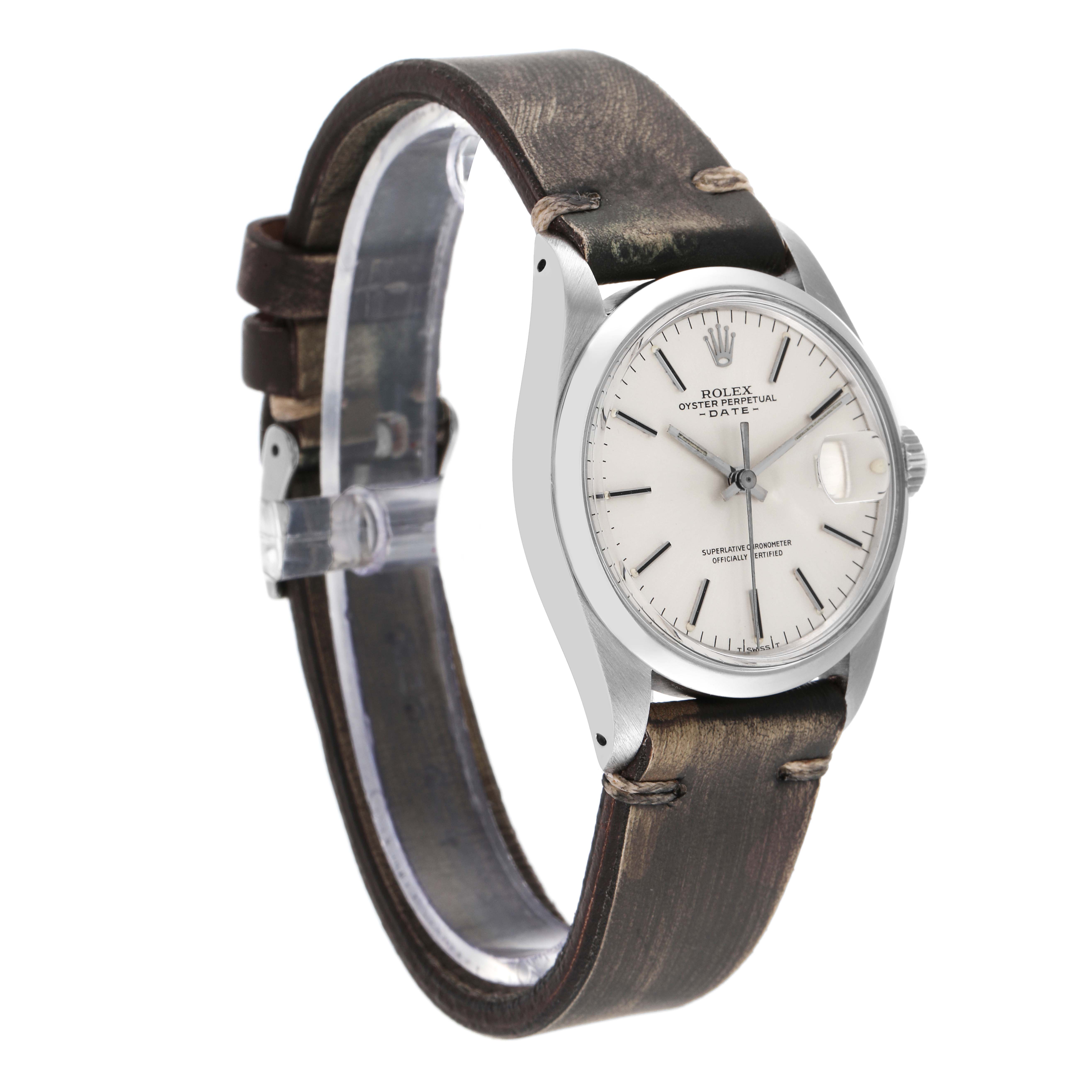 This image shows a side-angle view of a Rolex Vintage Collection 1500 Men's Stainless Steel Silver Dial 1500 Men's Stainless Steel Silver Dial model, displaying the watch face, bezel, and leather strap.