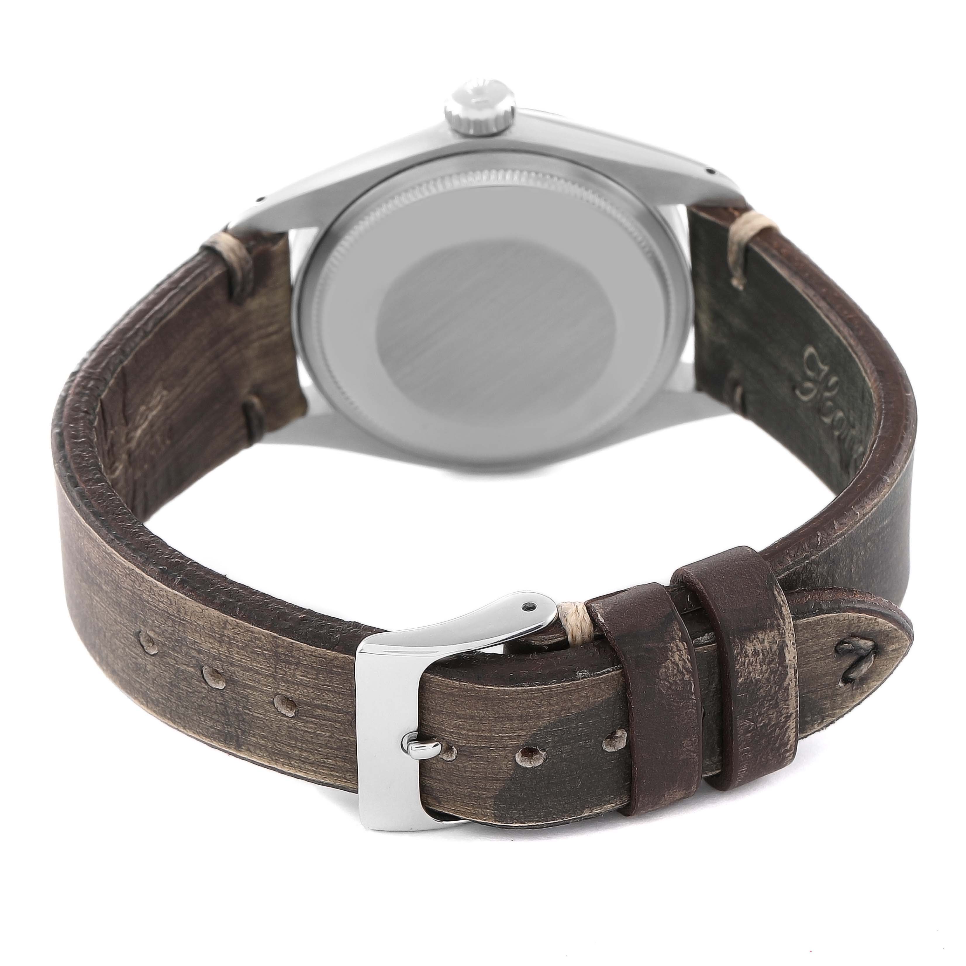 The image shows the back case and leather strap of the Rolex Vintage Collection 1500 Men's Stainless Steel Silver Dial 1500 Men's Stainless Steel Silver Dial model watch.