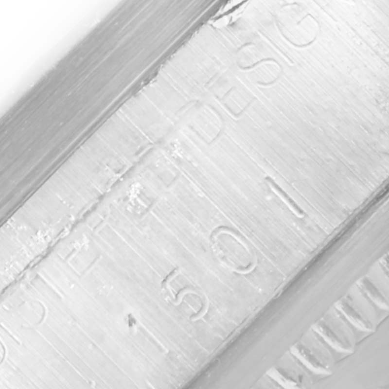 The image shows a close-up view of the side engraving on the casing of a Rolex Vintage Collection 1501 Men's Stainless Steel Black Dial 1501 Men's Stainless Steel Black Dial watch.