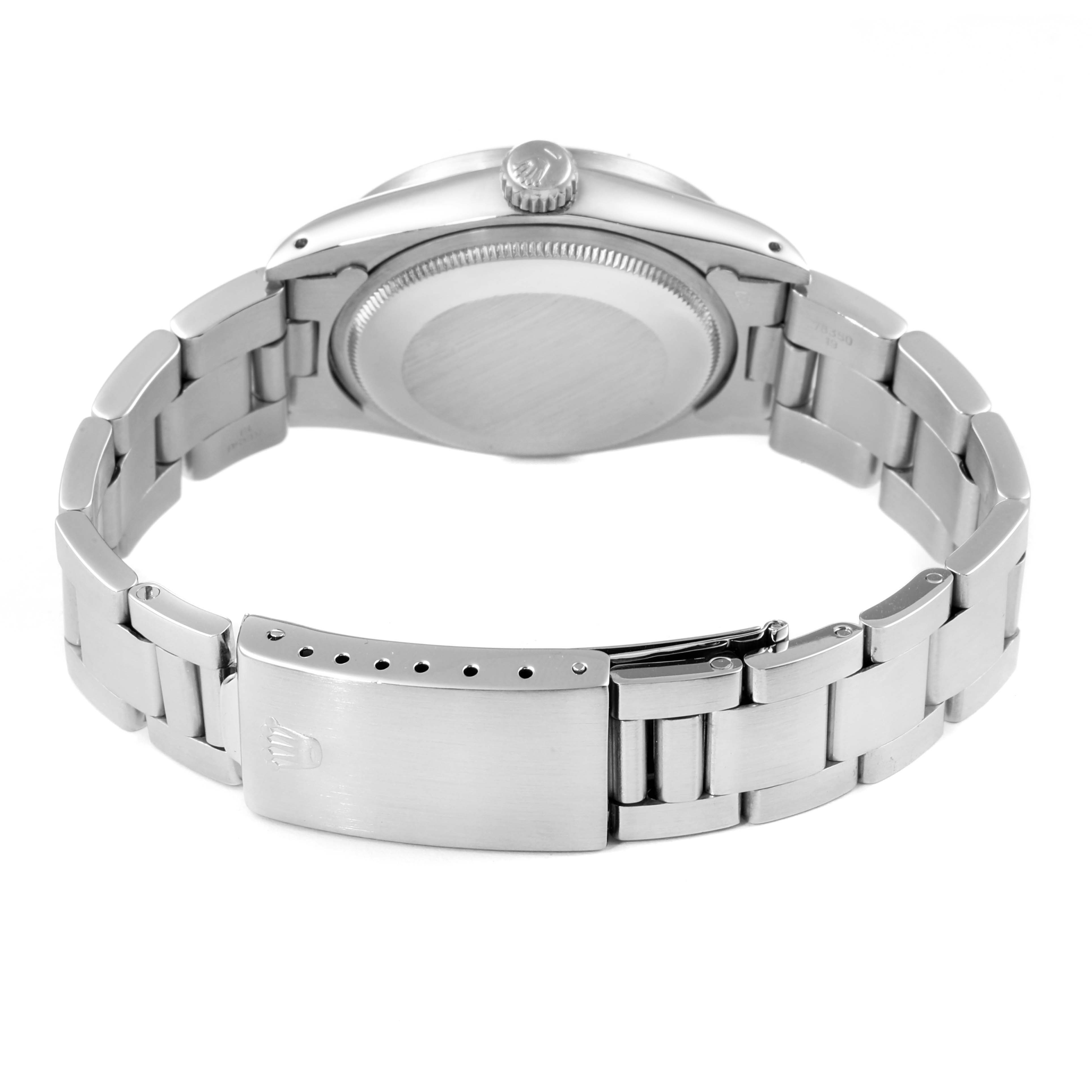 This image shows the back and clasp of a Vintage Collection watch by Rolex, with the bracelet fully extended.