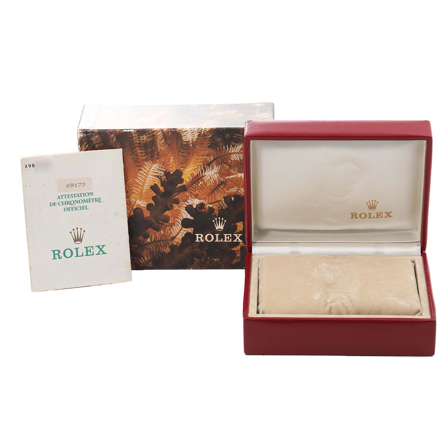 The image shows the Rolex Datejust 69173 Women's Steel and Gold (two tone) Black Dial 69173 Women's Steel and Gold (two tone) Black Dial watch's packaging, including its box, pillow, and manual, all viewed from the front.