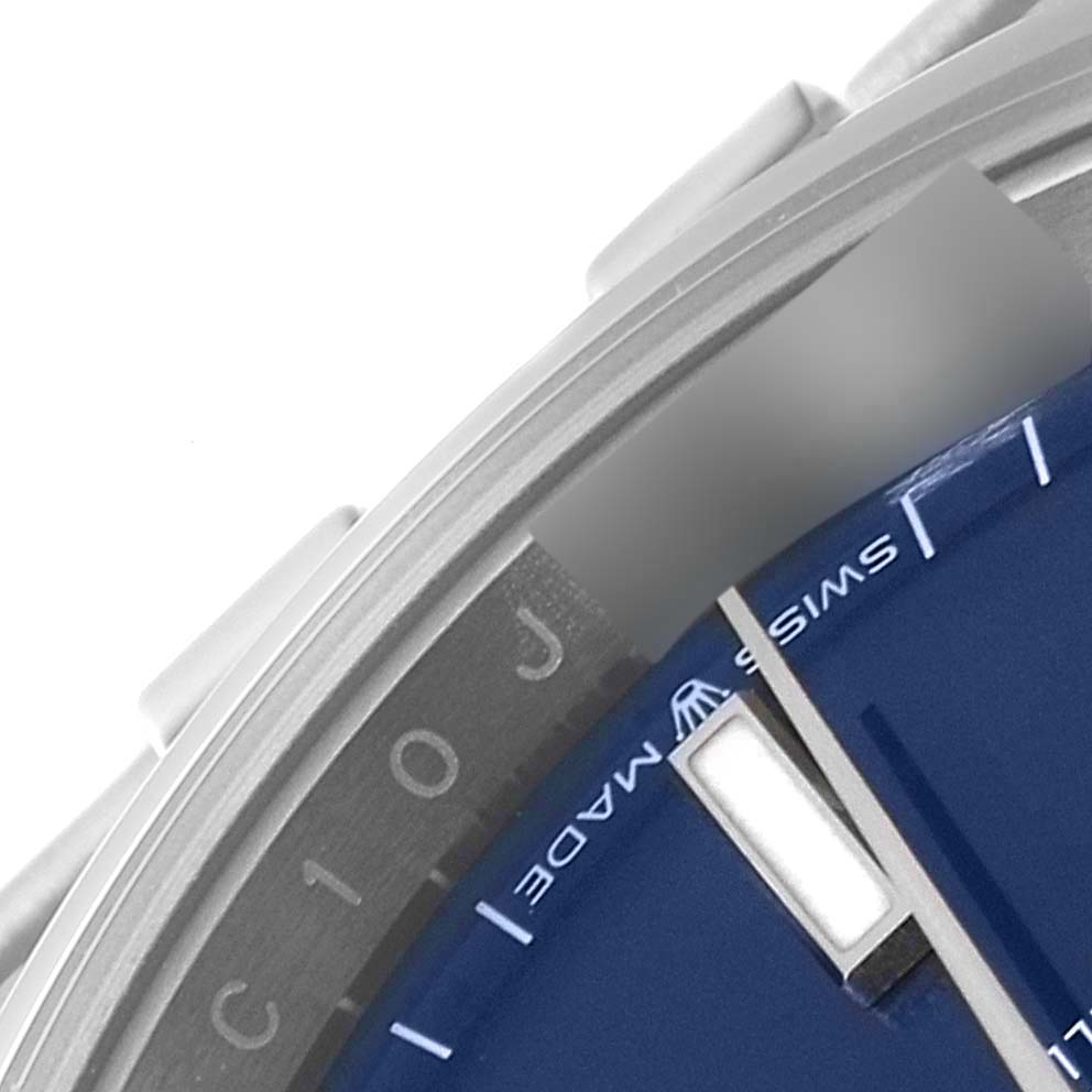 The image shows a close-up angle of the dial and part of the bezel of a Rolex Datejust 126200 Men's Stainless Steel Blue Dial 126200 Men's Stainless Steel Blue Dial watch.