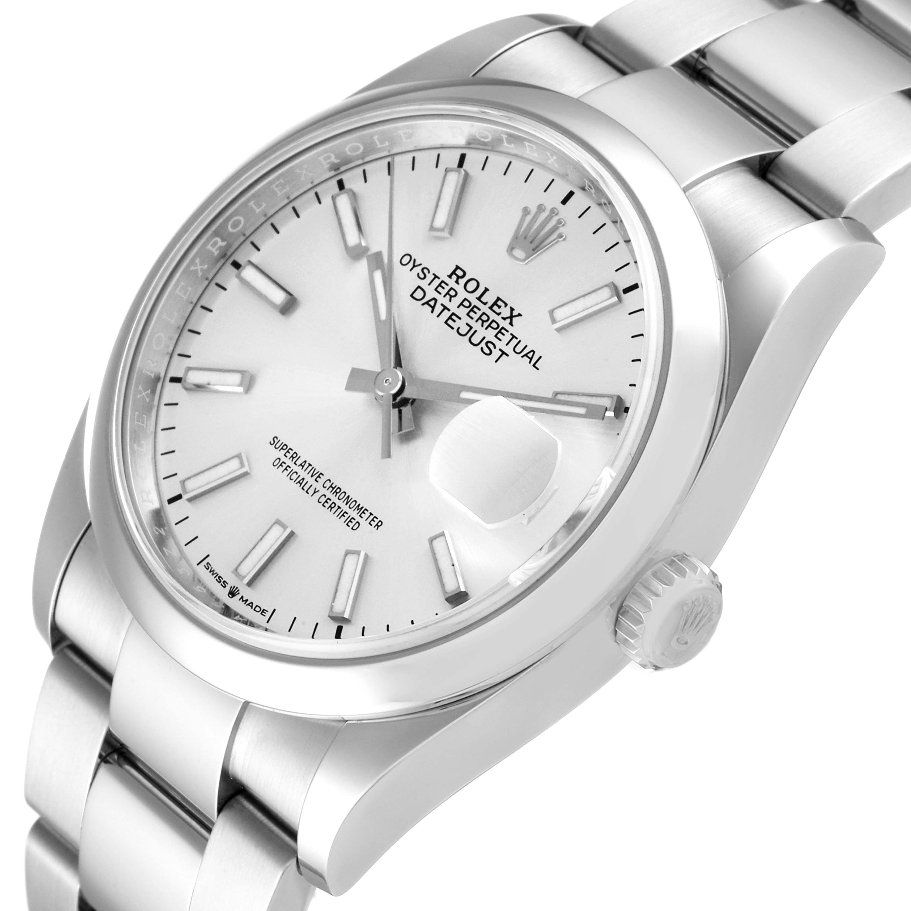 The Rolex Datejust 126200 Men's Stainless Steel Silver Dial 126200 Men's Stainless Steel Silver Dial watch is shown at an angled close-up, highlighting the dial, bezel, crown, and part of the bracelet.