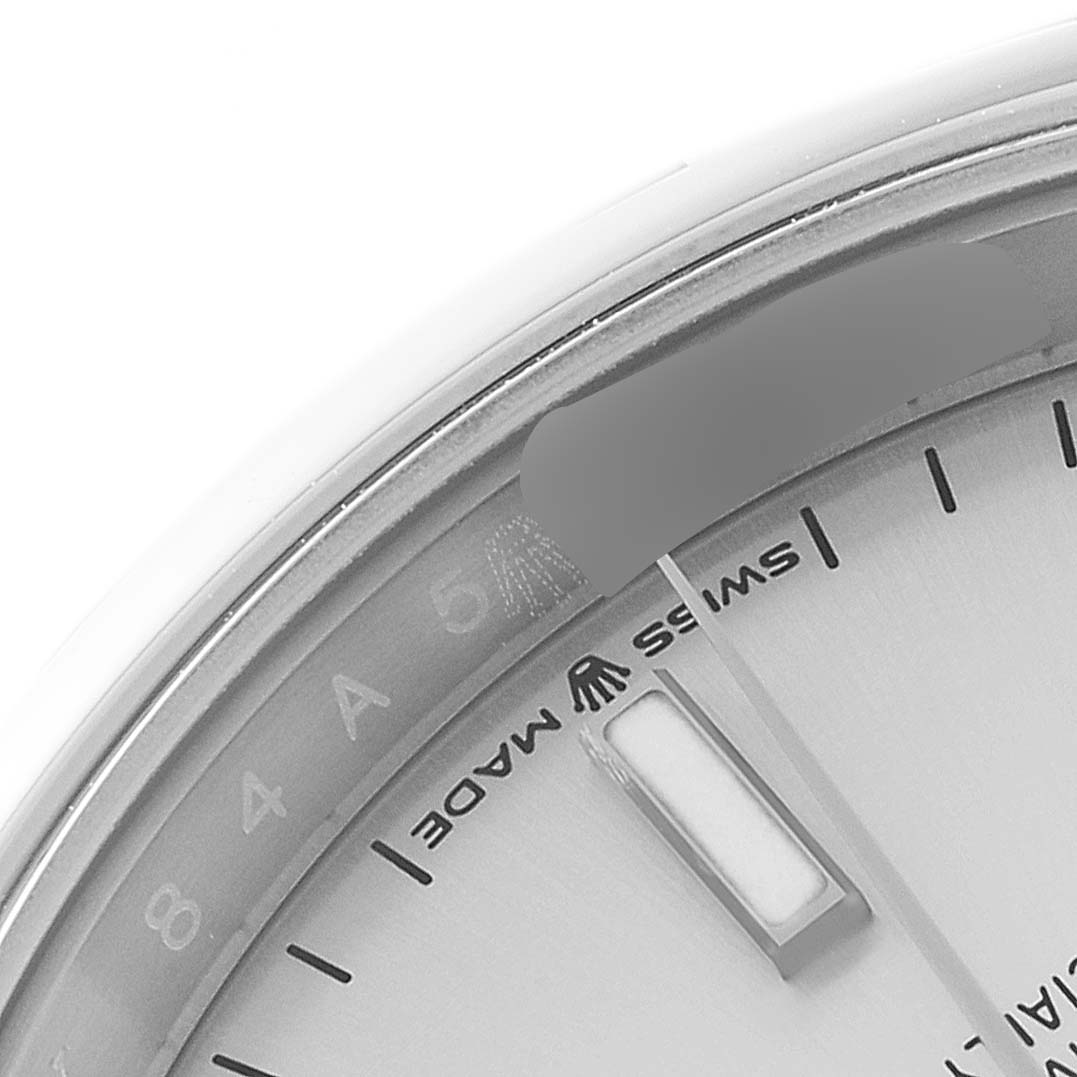 This is a close-up shot of the dial showing the bezel, index marker, and "Swiss Made" text of a Rolex Datejust 126200 Men's Stainless Steel Silver Dial 126200 Men's Stainless Steel Silver Dial watch.