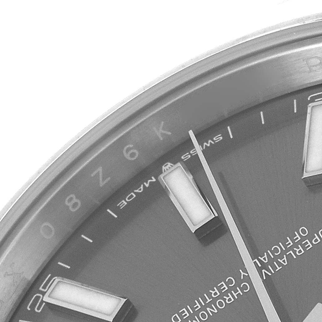The image shows a close-up of the dial and markers of a Rolex Datejust 41 126300 Men
s Stainless Steel Grey Dial 126300 Men
s Stainless Steel Grey Dial watch, highlighting the hour markers and part of the minute hand.