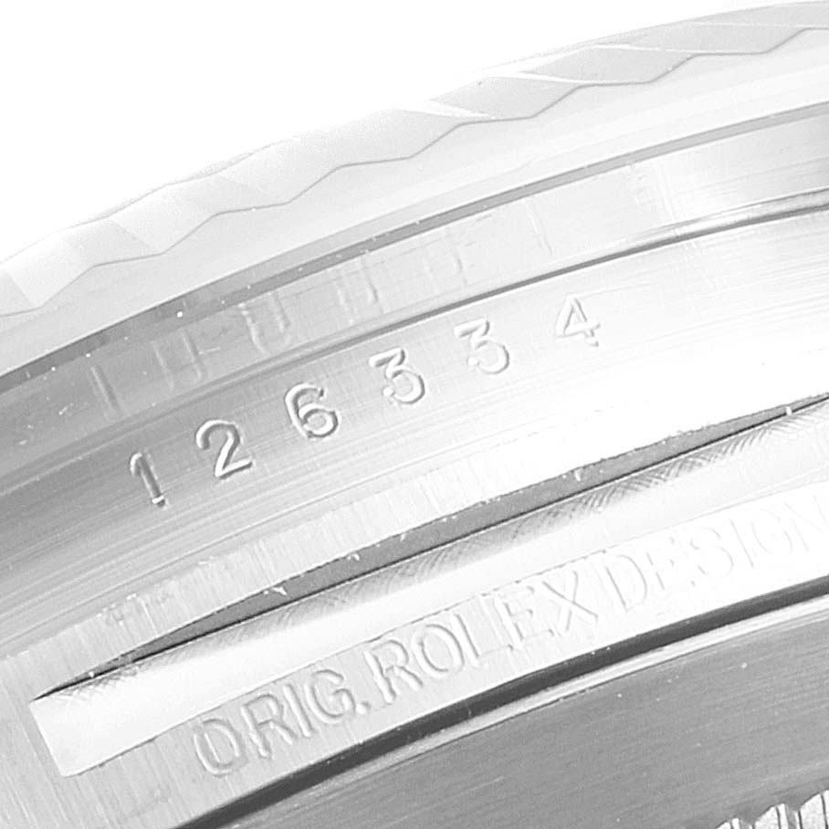 This image shows a close-up of the engraved model number and "ORIG. ROLEX DESIGN" text on the case of a Rolex Datejust 41 126334 Men's Stainless Steel Mother of Pearl Dial 126334 Men's Stainless Steel Mother of Pearl Dial watch.