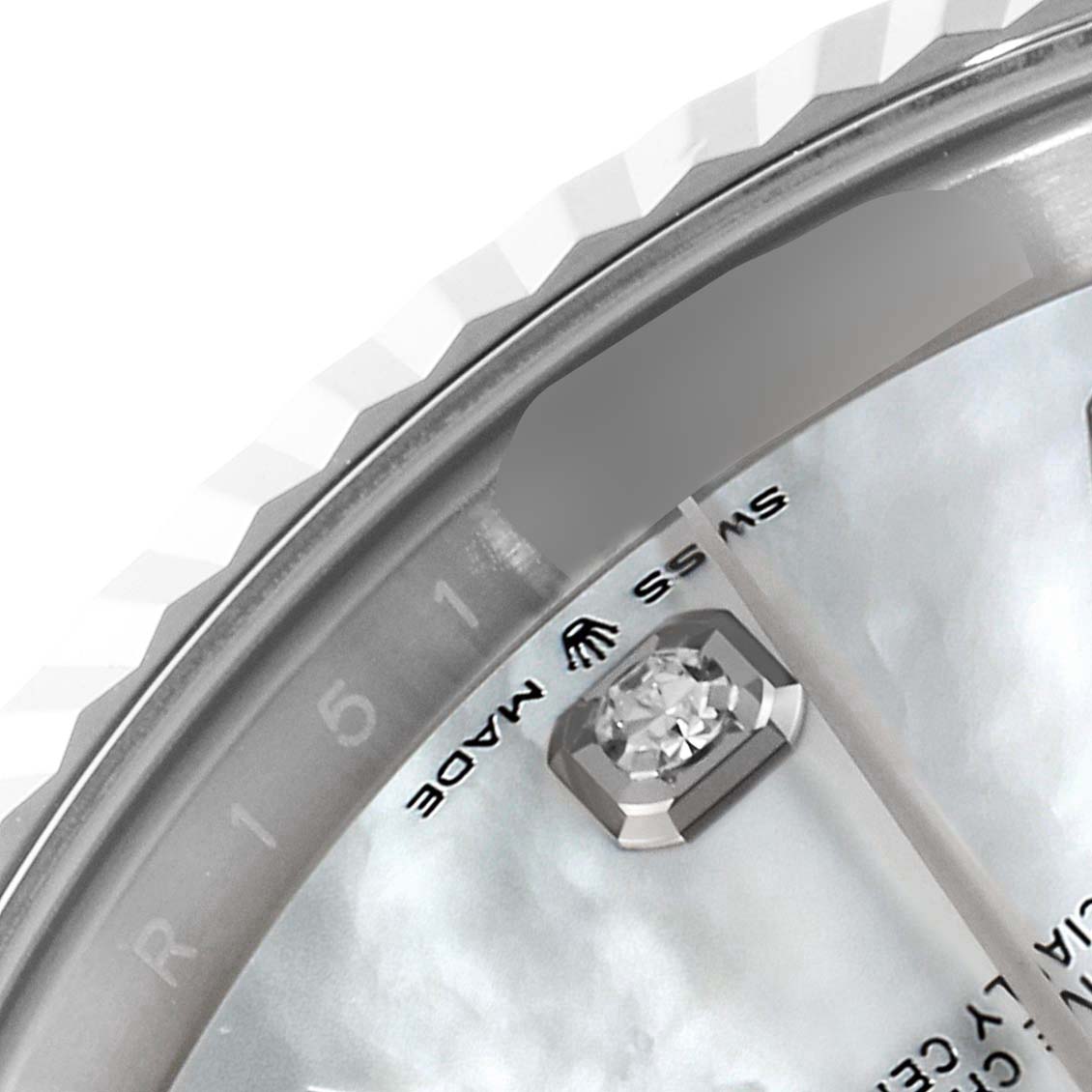 This close-up image of the Rolex Datejust 41 126334 Men's Stainless Steel Mother of Pearl Dial 126334 Men's Stainless Steel Mother of Pearl Dial watch shows a portion of the dial, the bezel, and a diamond hour marker.