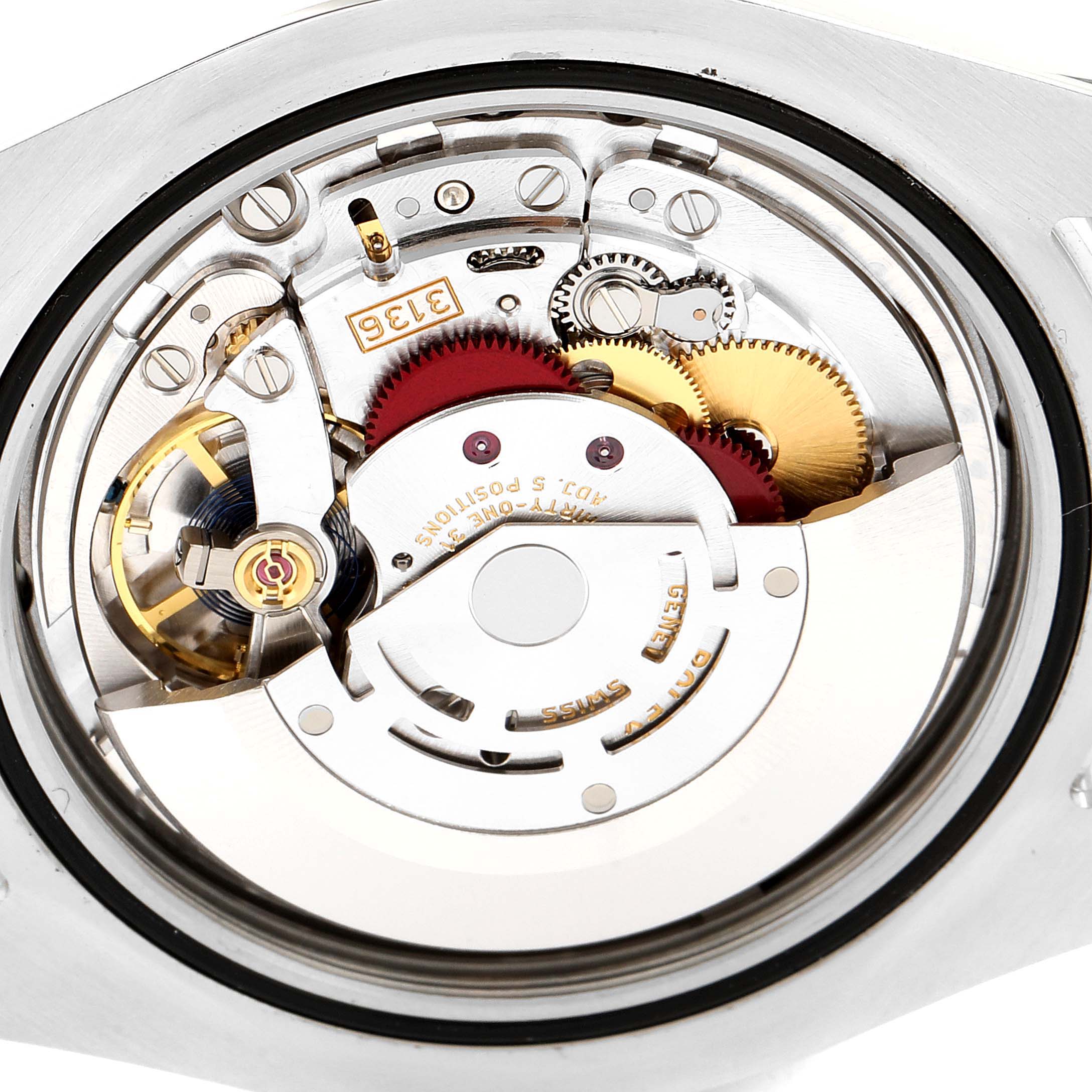 This image shows the intricate movement of the Rolex Datejust 41 116334 Men's Stainless Steel Black Dial 116334 Men's Stainless Steel Black Dial model from a rear angle with its internal components exposed.