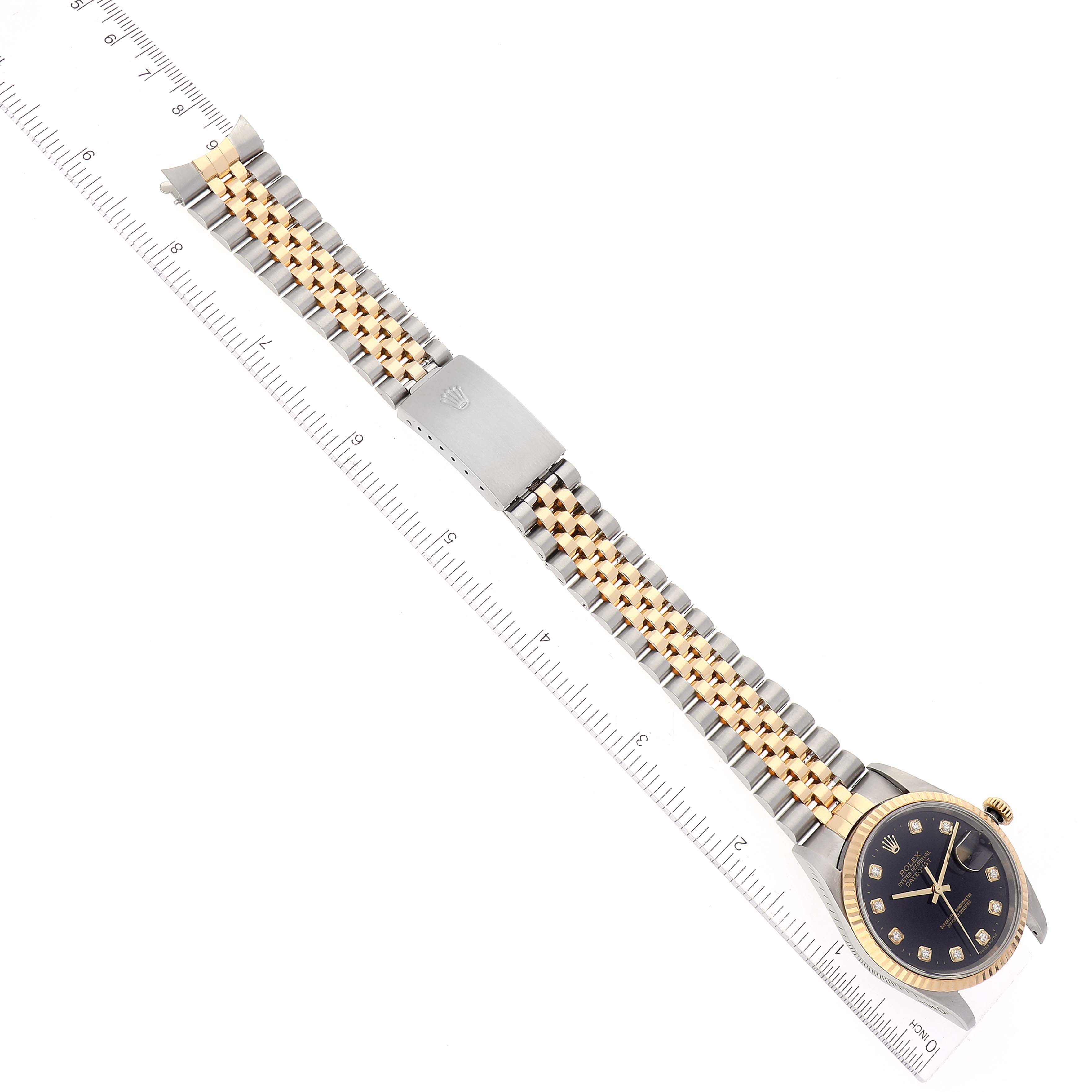 The Rolex Datejust 16233 Men's Steel and Gold (two tone) Black Dial 16233 Men's Steel and Gold (two tone) Black Dial watch is displayed flat, showcasing its full band, black dial, and gold bezel.