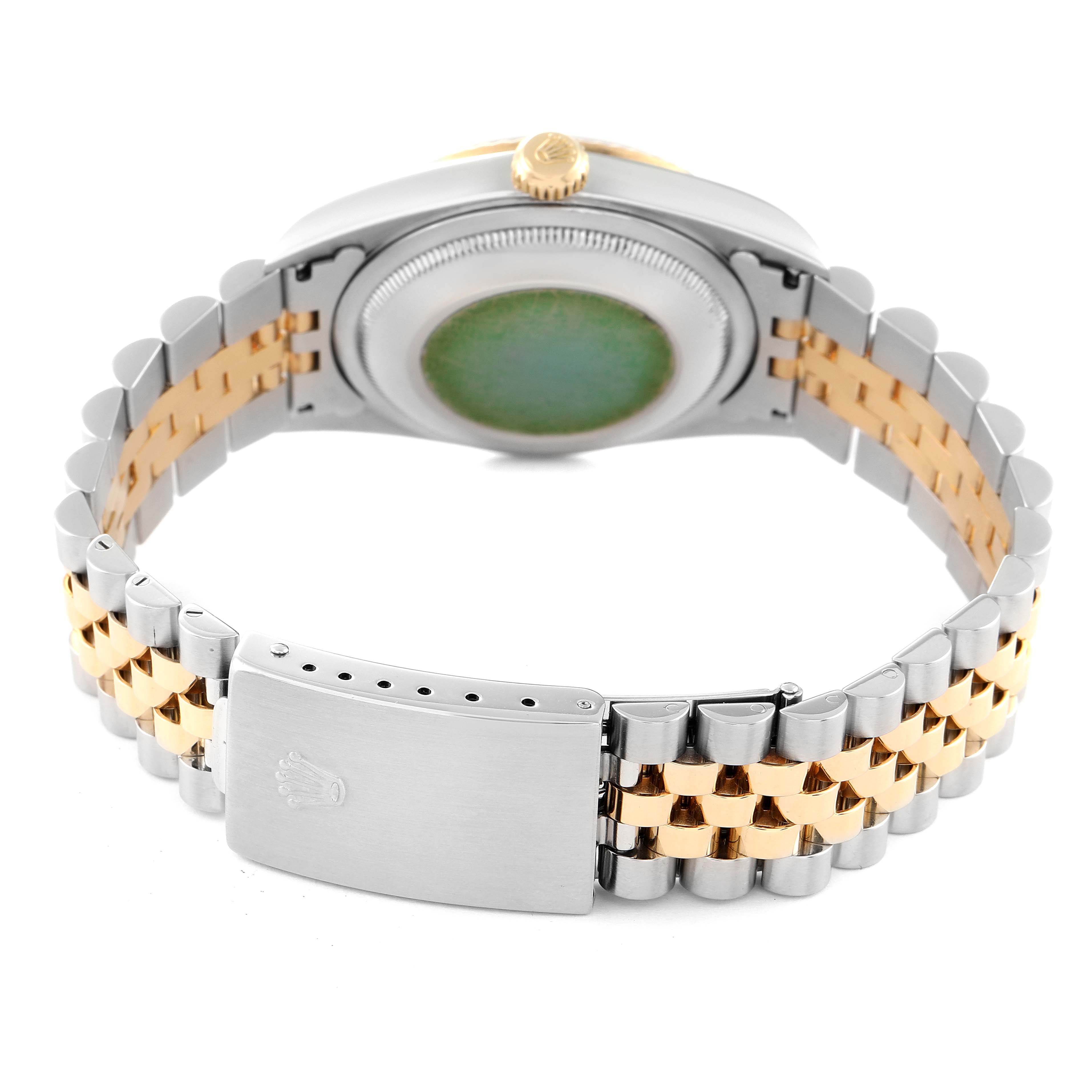 The image shows the back of a Rolex Datejust 16233 Men's Steel and Gold (two tone) Black Dial 16233 Men's Steel and Gold (two tone) Black Dial watch, focusing on its two-tone bracelet and closed clasp.