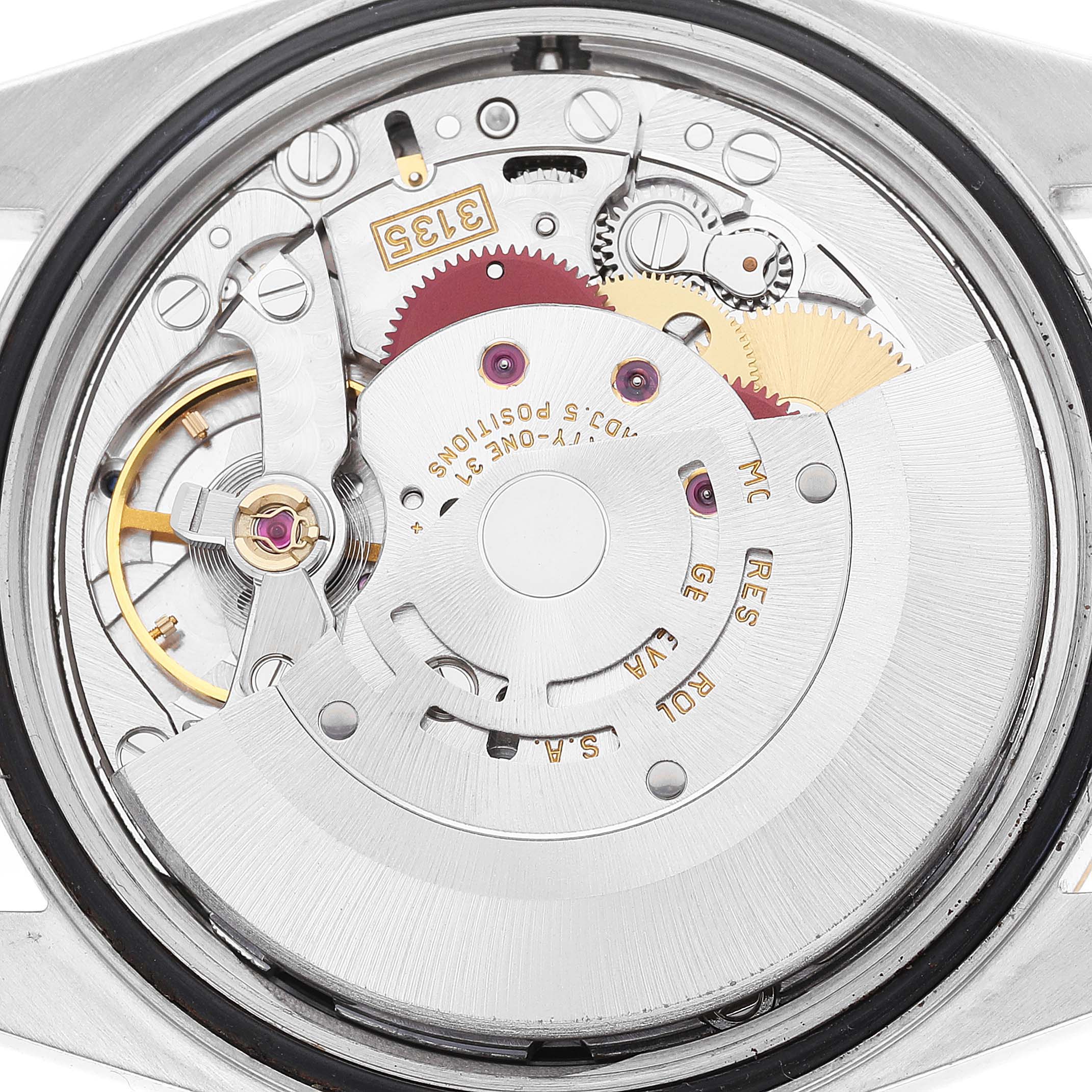 This image shows a close-up view of the Rolex Datejust 16233 Men's Steel and Gold (two tone) Black Dial 16233 Men's Steel and Gold (two tone) Black Dial movement, displaying its intricate internal mechanics.