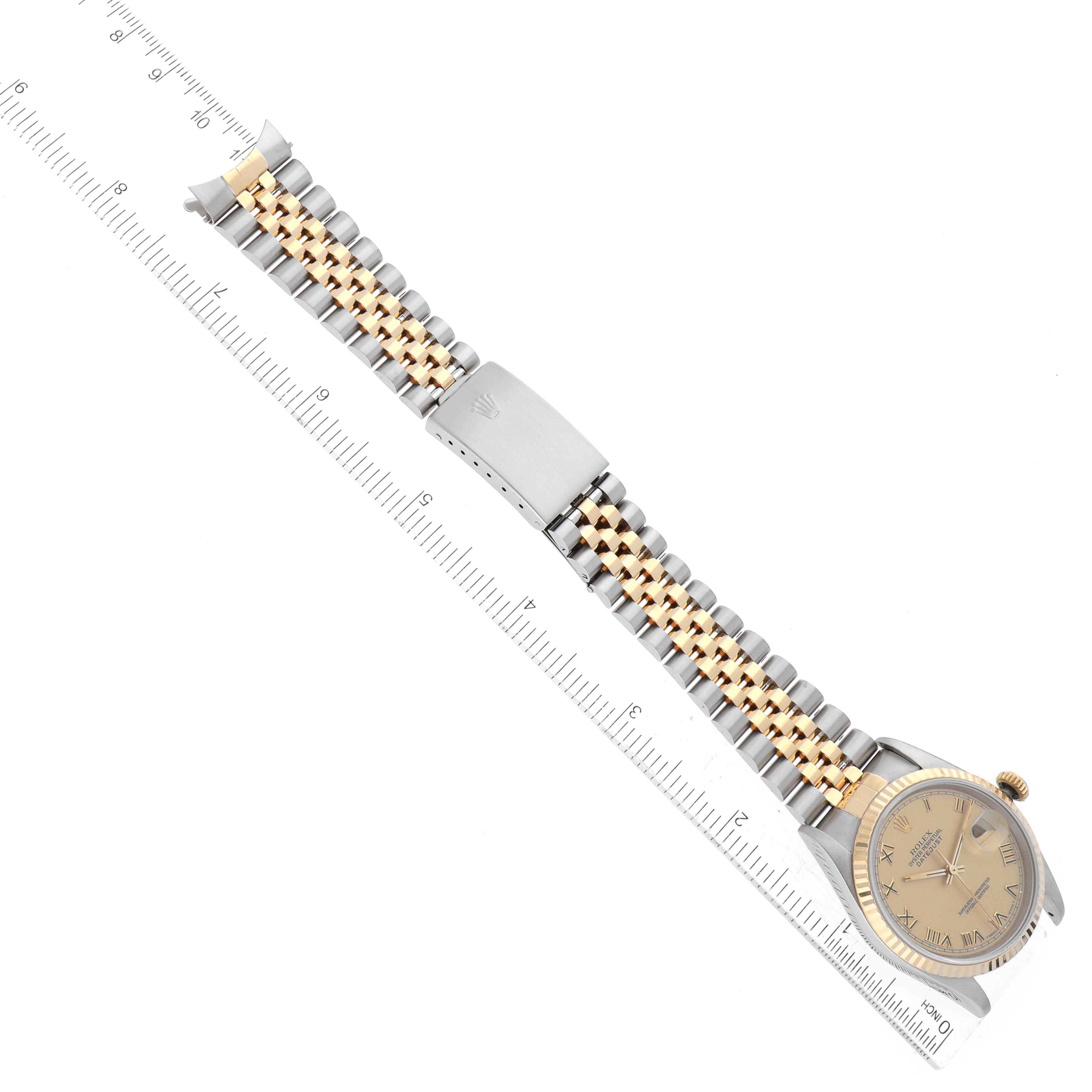 The Rolex Datejust 16233 Men's Steel and Gold (two tone) Champagne Dial 16233 Men's Steel and Gold (two tone) Champagne Dial watch is shown from a top-down angle, displaying the entire face, bracelet, and clasp.