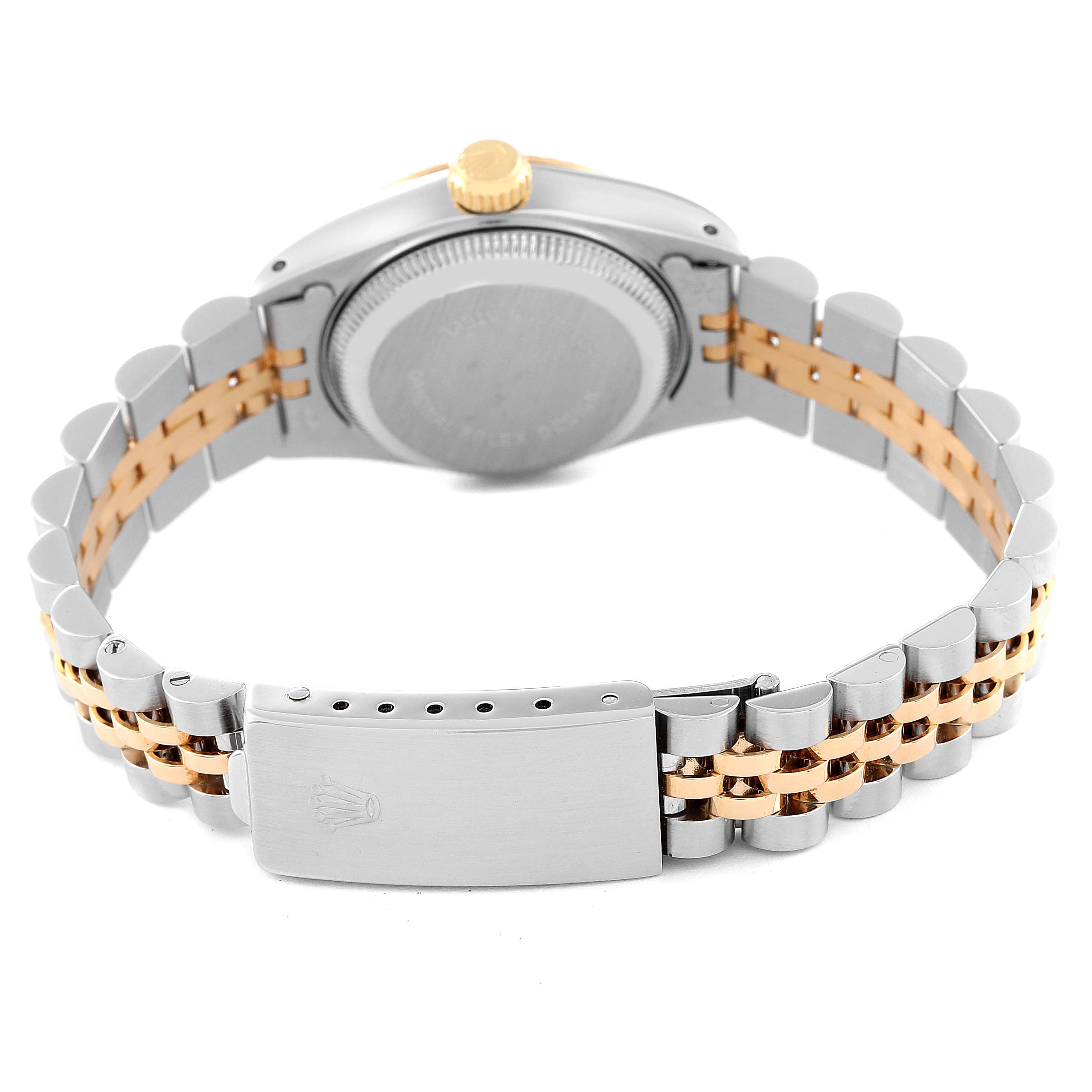 This image shows the back view of the Rolex Datejust 69173 Women's Steel and Gold (two tone) Champagne Dial 69173 Women's Steel and Gold (two tone) Champagne Dial watch, featuring its clasp, bracelet, and case back.