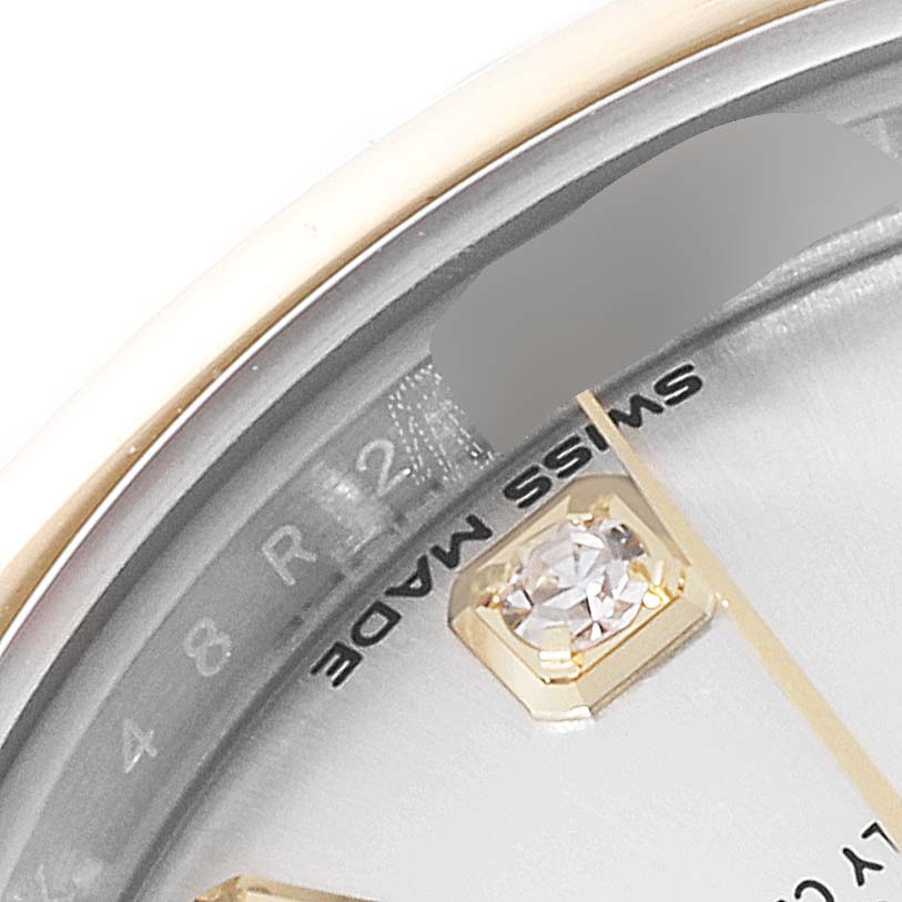 The image shows a close-up of the Rolex Datejust 279163 Women's Steel and Gold (two tone) Silver Dial 279163 Women's Steel and Gold (two tone) Silver Dial dial, focusing on the diamond marker, bezel edge, and "SWISS MADE" text.