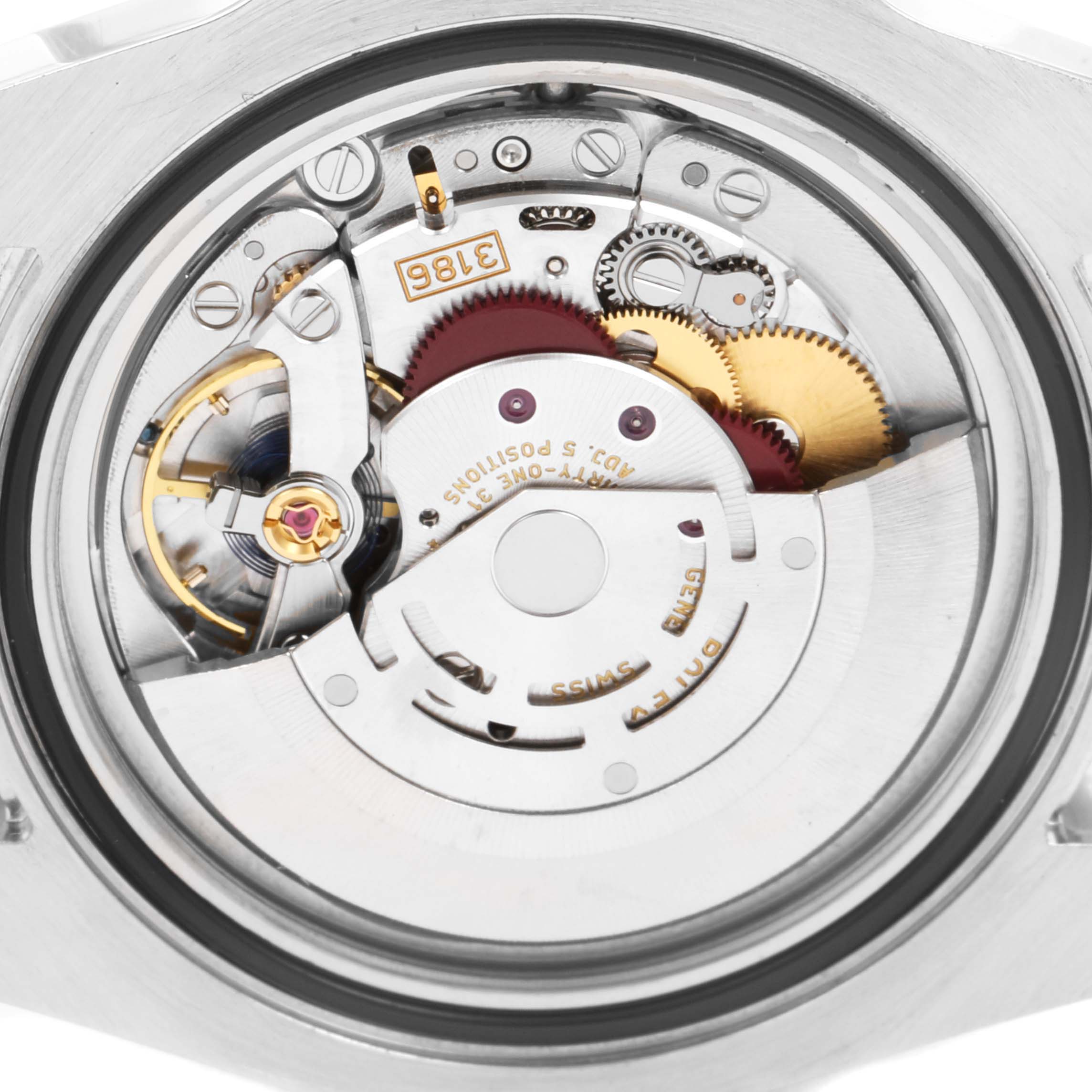 This image shows a close-up of the movement assembly of a Rolex GMT-Master 116710 Men
s Stainless Steel Black Dial 116710 Men
s Stainless Steel Black Dial watch, including gears and other internal components.