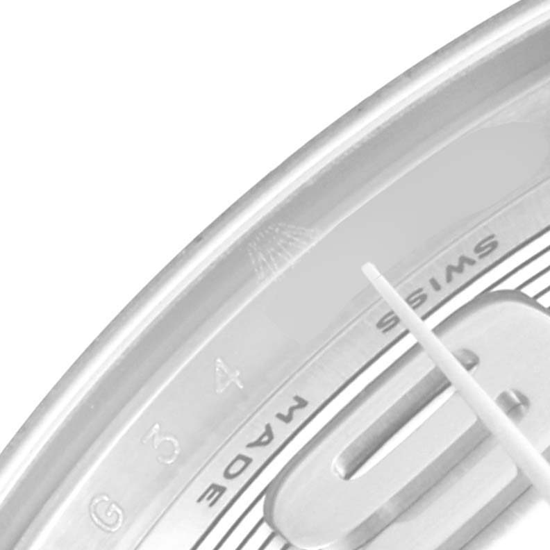 The image shows a close-up angle of the dial and part of the bezel of a Rolex Mid-Size 177200 Women
s Stainless Steel Silver Dial 177200 Women
s Stainless Steel Silver Dial model watch.