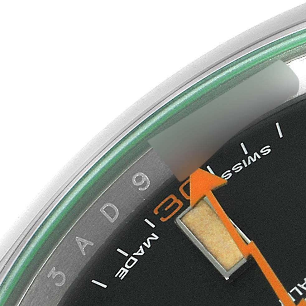 The image shows a close-up section of the dial and bezel of a Rolex Milgauss 116400V Men's Stainless Steel Black Dial 116400V Men's Stainless Steel Black Dial watch.