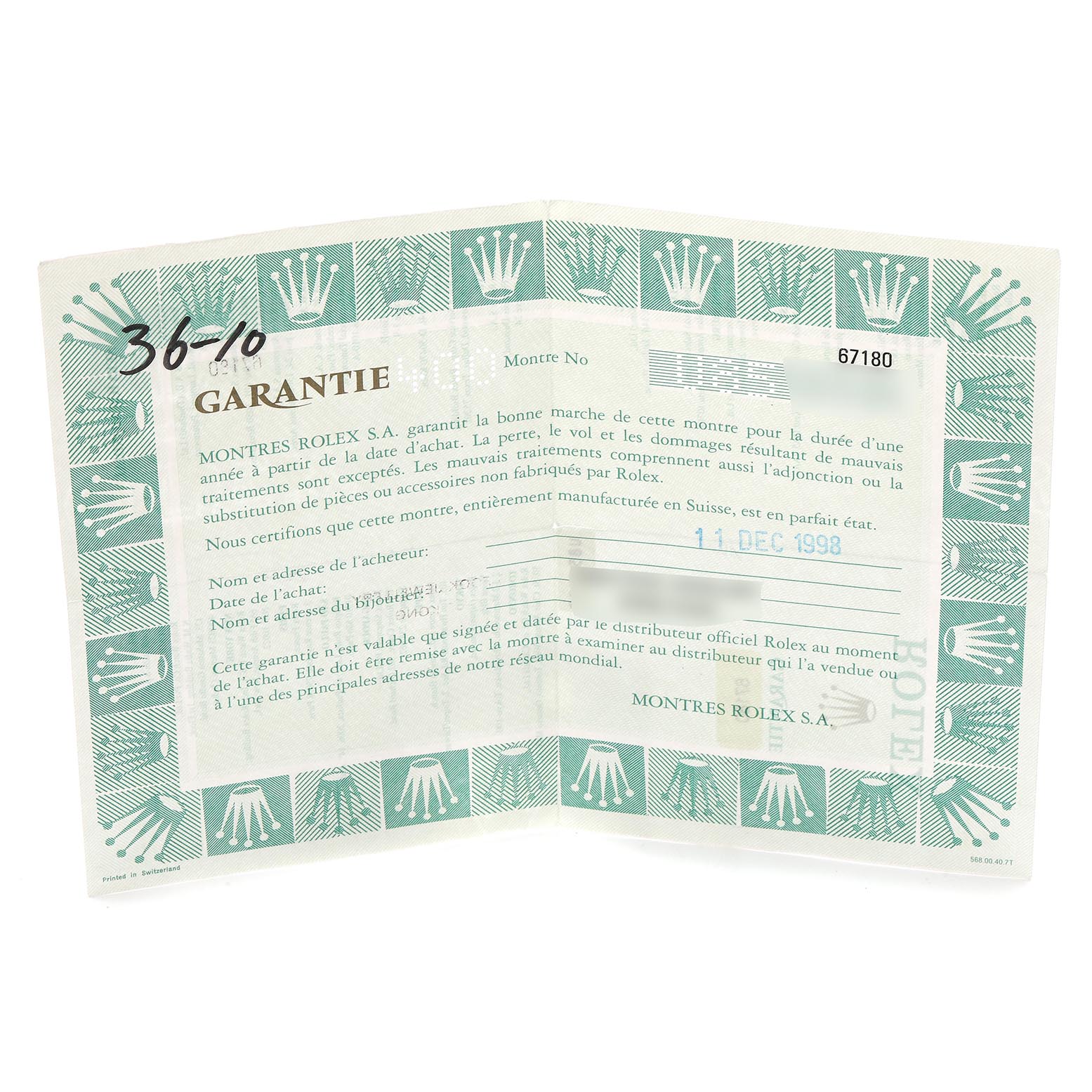 This image shows a Rolex guarantee certificate for the Oyster Perpetual model, viewed at a slight angle to reveal text and branding.