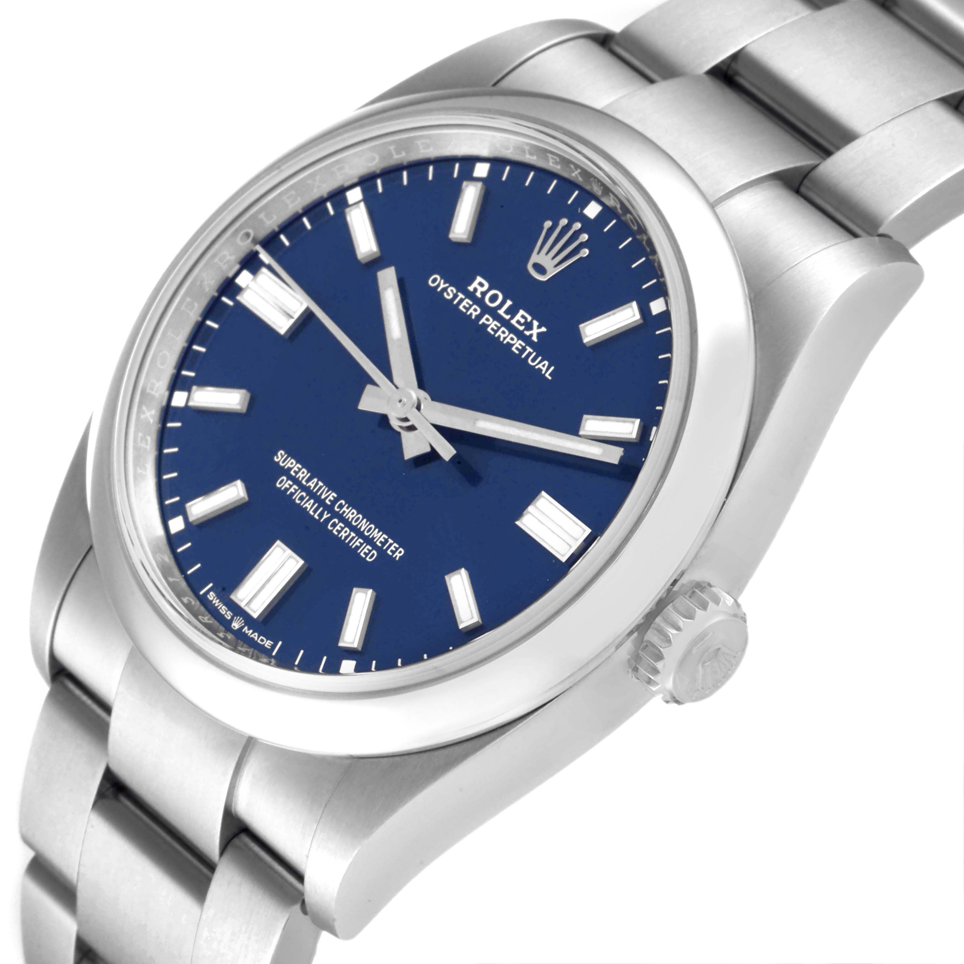 This image shows a close-up angle of the Rolex Oyster Perpetual 126000 Men's Stainless Steel Blue Dial 126000 Men's Stainless Steel Blue Dial watch, highlighting its blue dial, crown, and stainless steel bracelet.
