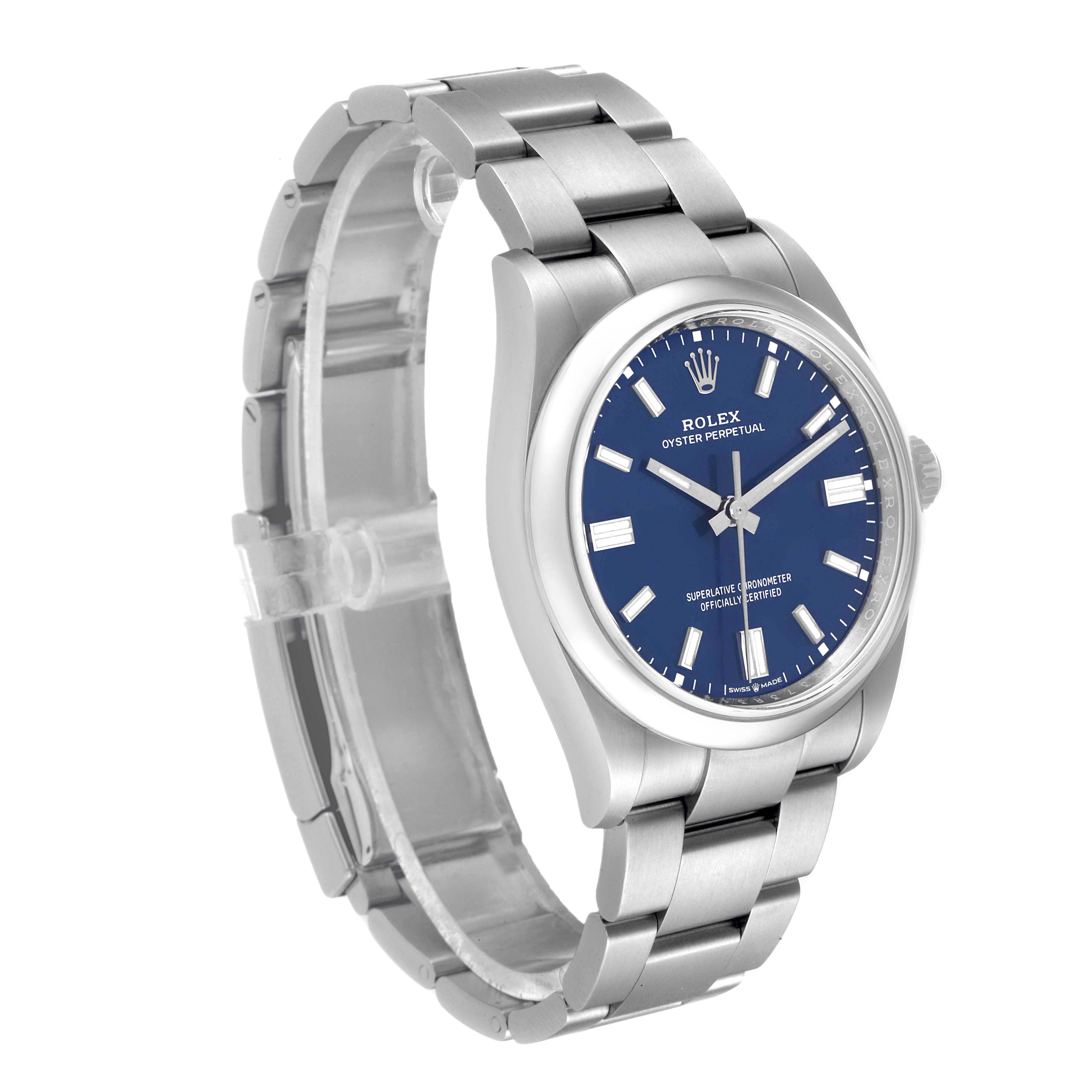The image shows a Rolex Oyster Perpetual 126000 Men's Stainless Steel Blue Dial 126000 Men's Stainless Steel Blue Dial watch angled to display its blue dial and stainless steel bracelet.