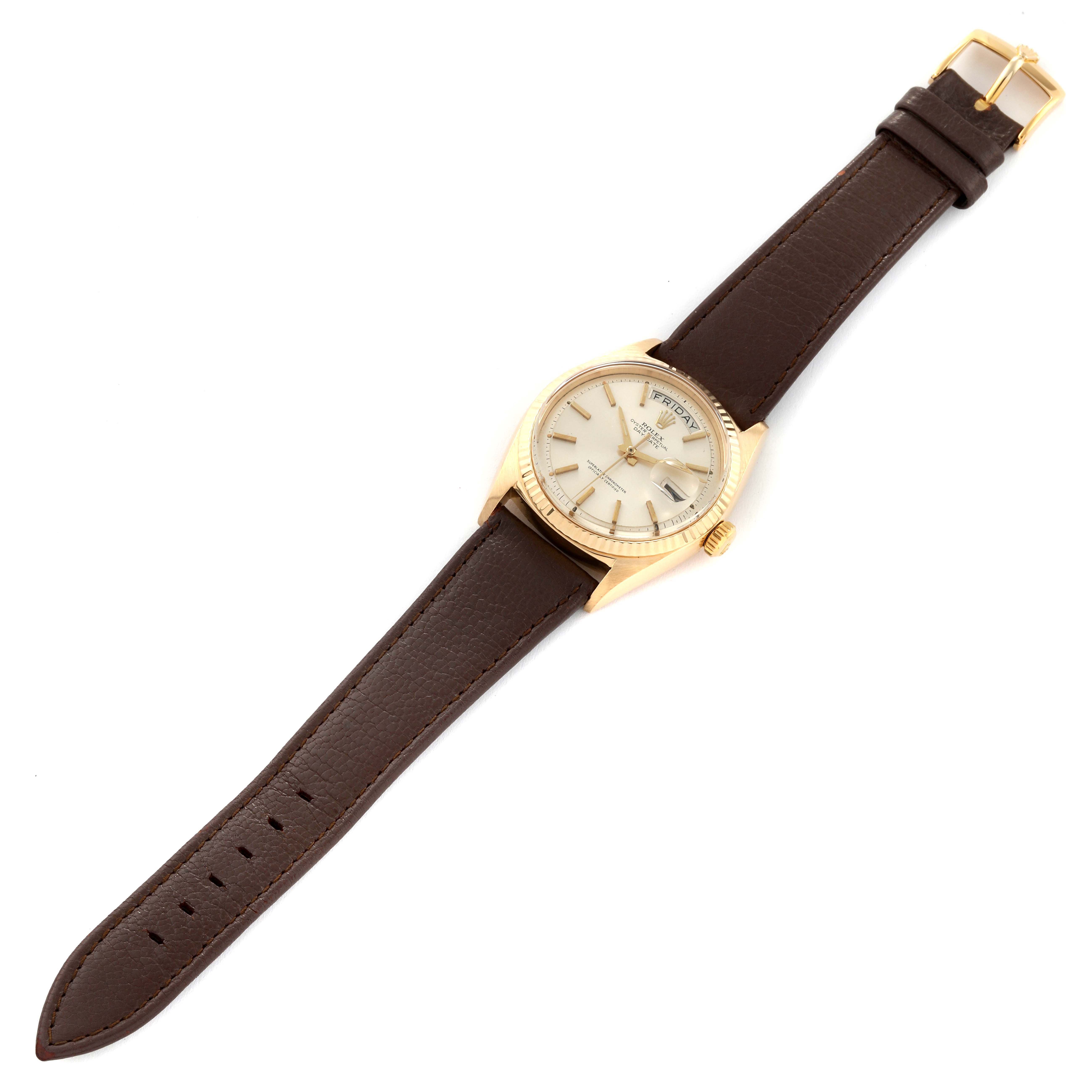 The image shows a Rolex Vintage Collection 1803 Men's Yellow Gold Silver Dial 1803 Men's Yellow Gold Silver Dial watch from an overhead angle, displaying the face, bezel, crown, and leather strap.