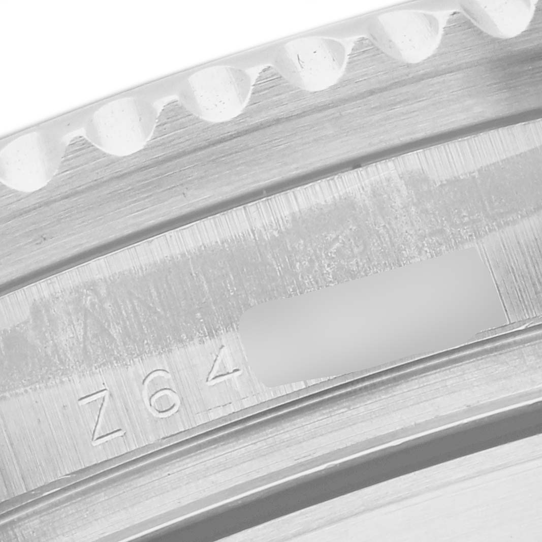 This image shows a close-up of the bezel and case side of a Rolex Sea-Dweller 16600 Men
s Stainless Steel Black Dial 16600 Men
s Stainless Steel Black Dial watch.