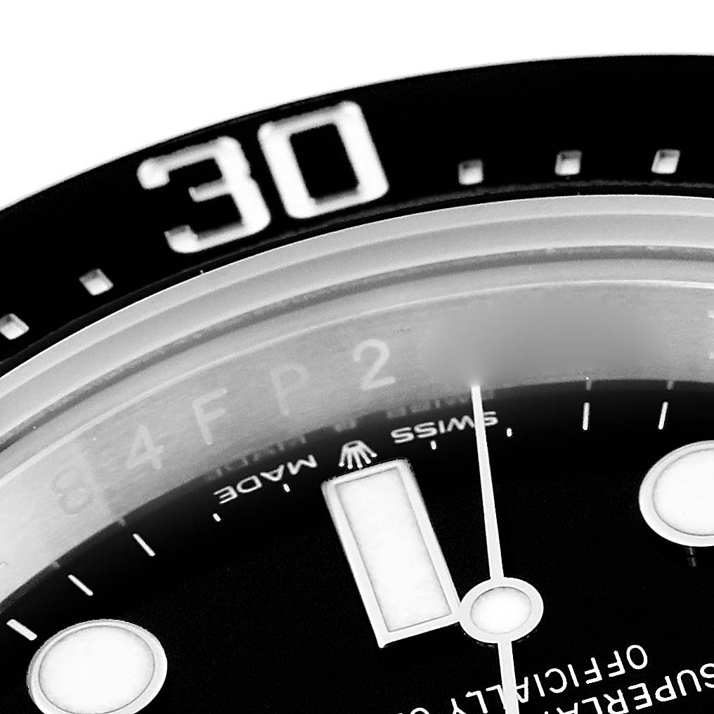 The image shows a close-up angle of the dial and bezel of the Rolex Sea-Dweller 126600 Men
s Stainless Steel Black Dial 126600 Men
s Stainless Steel Black Dial.