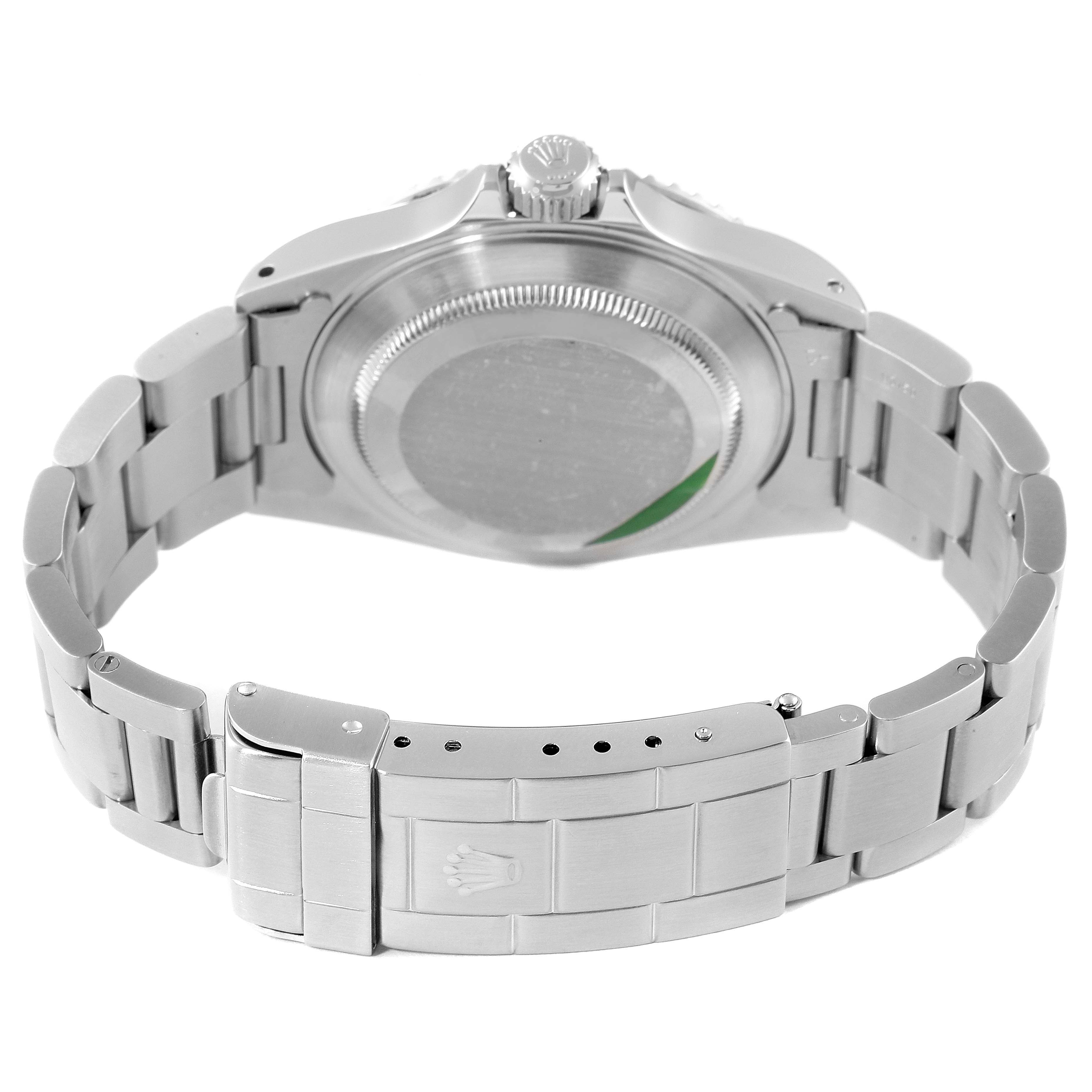 The image shows the back view of a Rolex Submariner 14060 Men's Stainless Steel Black Dial 14060 Men's Stainless Steel Black Dial watch, highlighting the case back, crown, and metal bracelet with clasp.