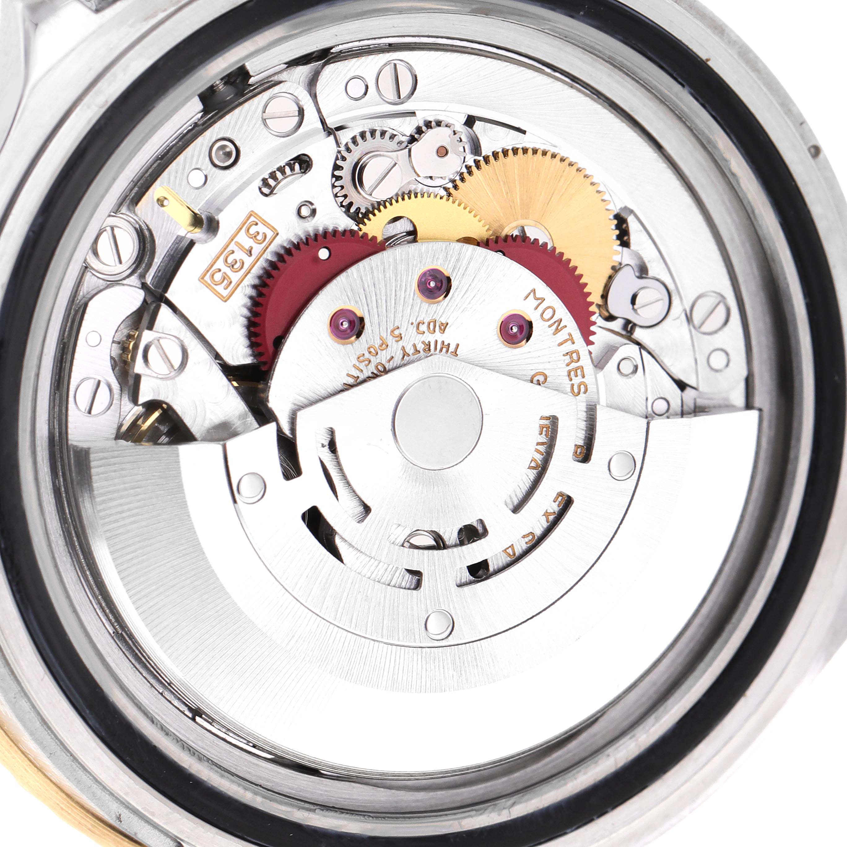 This image shows the internal movement mechanism of the Rolex Submariner 16613 Men
s Steel and Gold (two tone) Champagne Dial 16613 Men
s Steel and Gold (two tone) Champagne Dial watch from a close-up angle.