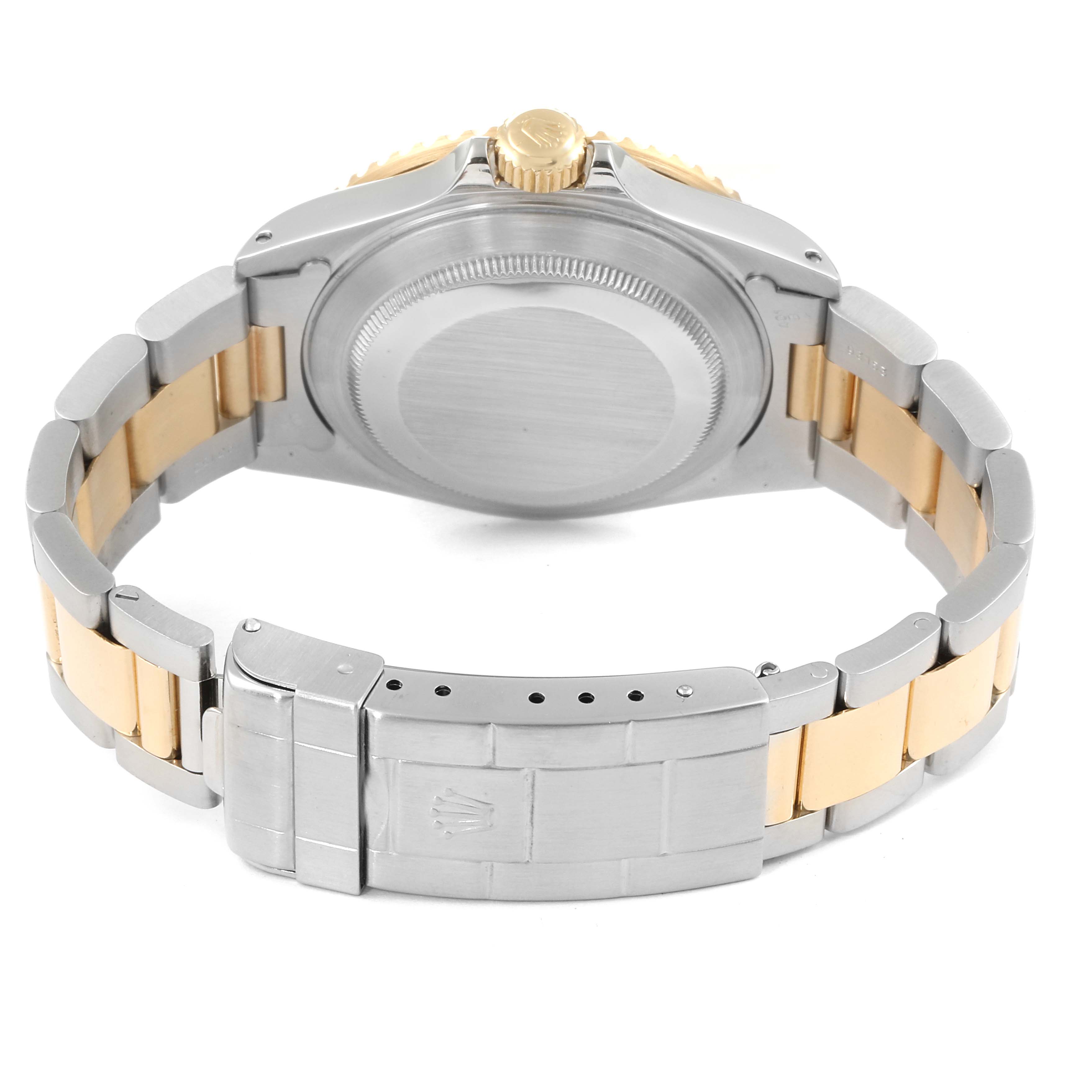 The image shows the back case and bracelet of a Rolex Submariner 16613 Men
s Steel and Gold (two tone) Champagne Dial 16613 Men
s Steel and Gold (two tone) Champagne Dial, viewed from the rear angle.