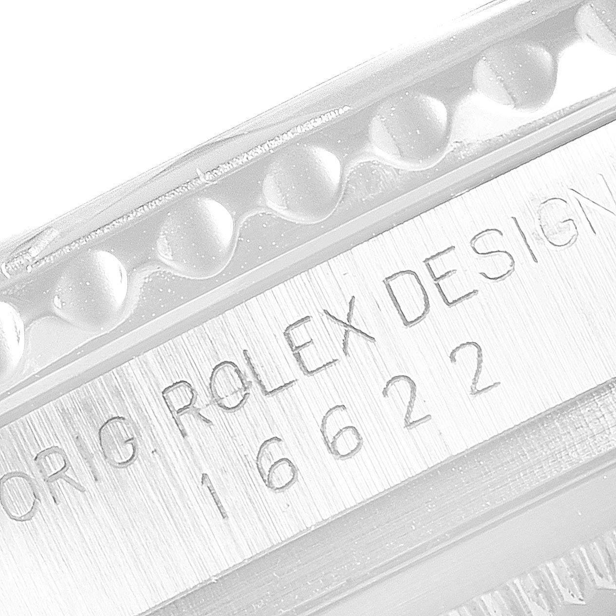 The image shows a close-up of the bezel and the engraved side of the case on a Rolex Yacht-Master 16622 Men
s Stainless Steel Silver Dial 16622 Men
s Stainless Steel Silver Dial watch.