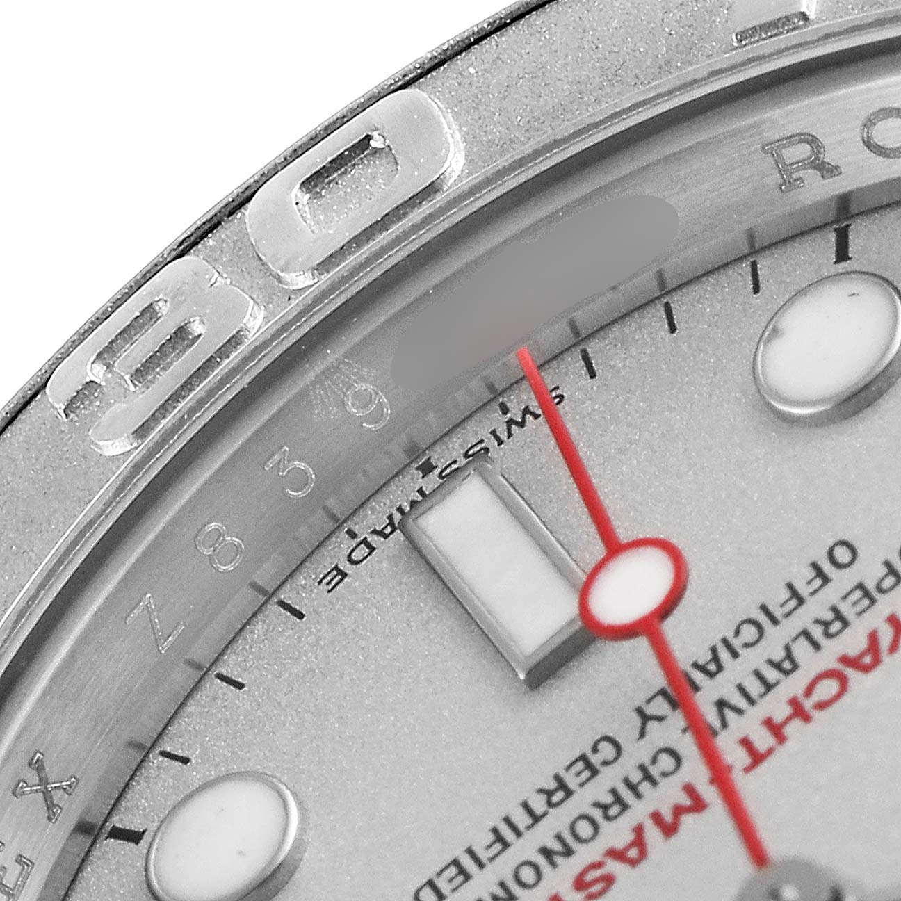 The image shows a close-up of the dial and partial bezel of a Rolex Yacht-Master 16622 Men
s Stainless Steel Silver Dial 16622 Men
s Stainless Steel Silver Dial watch, including the 30-minute marker and parts of the hands.