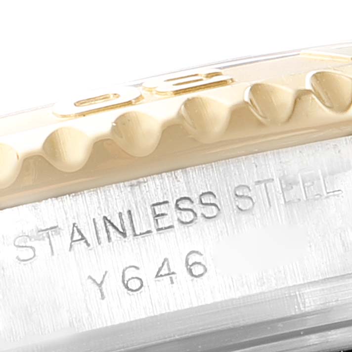 The image shows a close-up of the stainless steel bezel and some engraved details of a Rolex Yacht-Master 169623 Women's Steel and Gold (two tone) White Dial 169623 Women's Steel and Gold (two tone) White Dial watch.