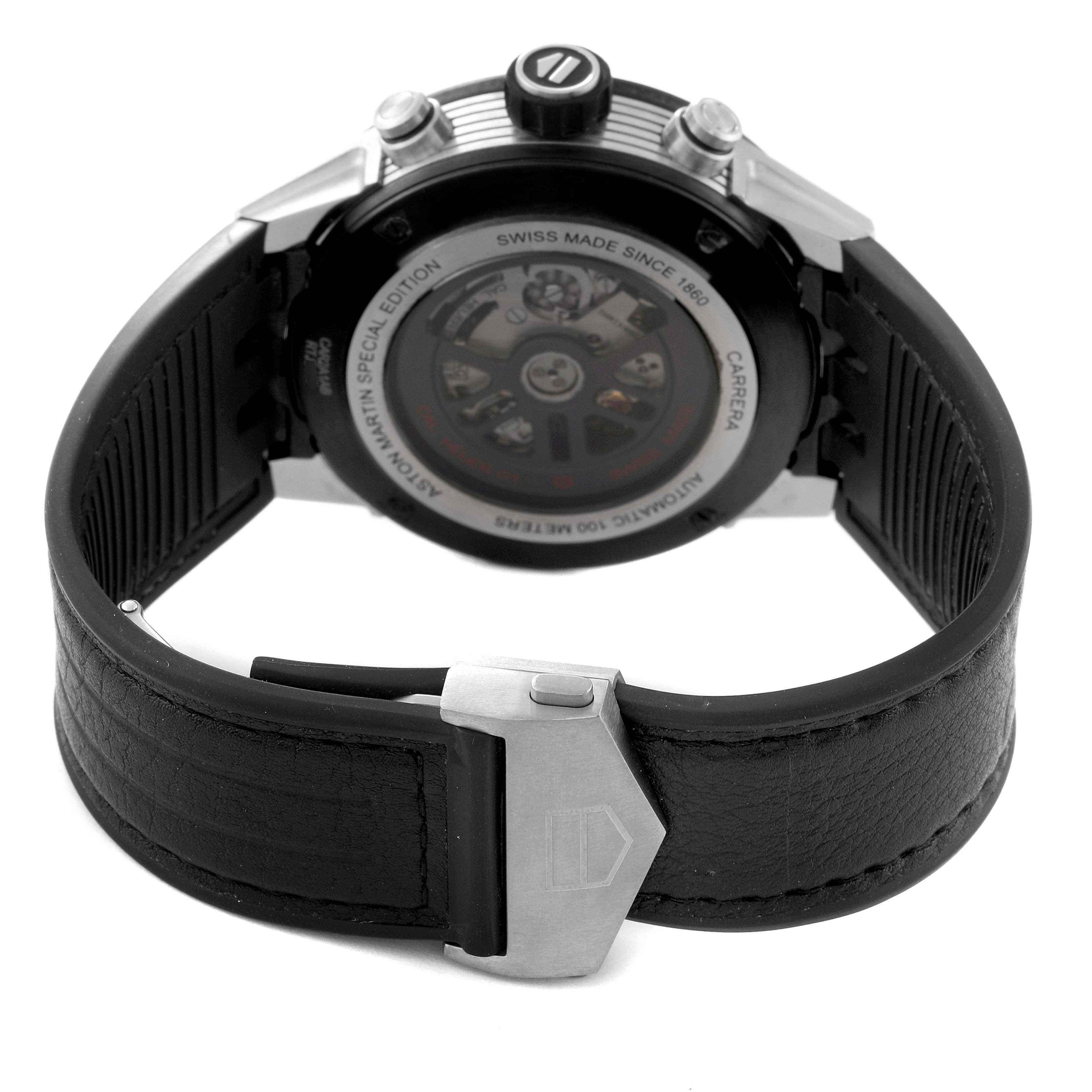 The image shows the back view of a Tag Heuer Carrera CAR2A1AB.FT6163 Men's Stainless Steel Black Dial CAR2A1AB.FT6163 Men's Stainless Steel Black Dial watch, highlighting the case back, crown, and leather strap with a clasp.