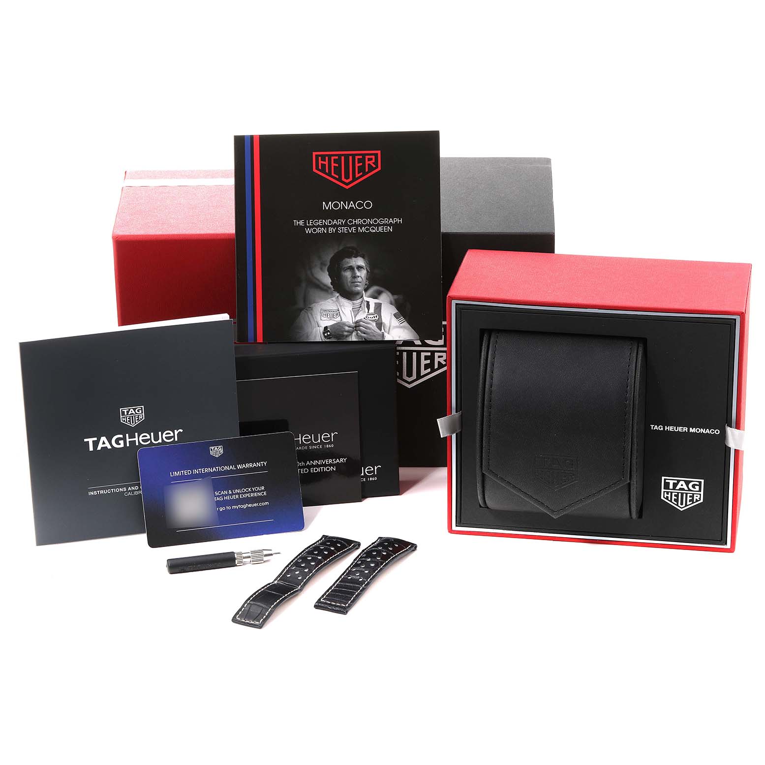 The image shows a front view of Tag Heuer Monaco CAW211P Men
s Stainless Steel Blue Dial CAW211P Men
s Stainless Steel Blue Dial packaging with manuals, warranty card, straps, a tool, and a watch box.