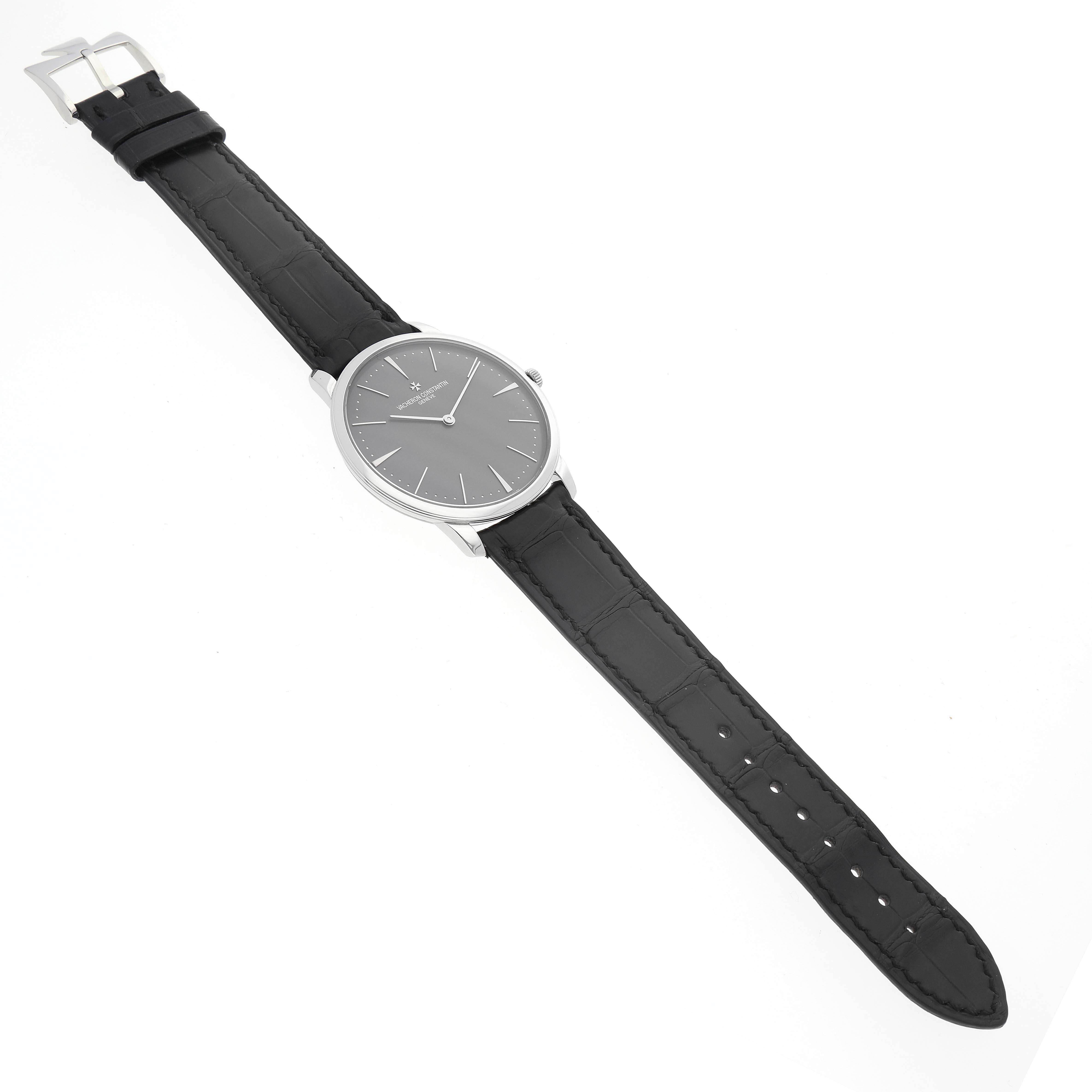 The image shows a Vacheron Constantin Patrimony 81180/000P-9539 Men's Platinum Grey Dial 81180/000P-9539 Men's Platinum Grey Dial watch from an overhead angle, highlighting the dial, case, and black leather strap.