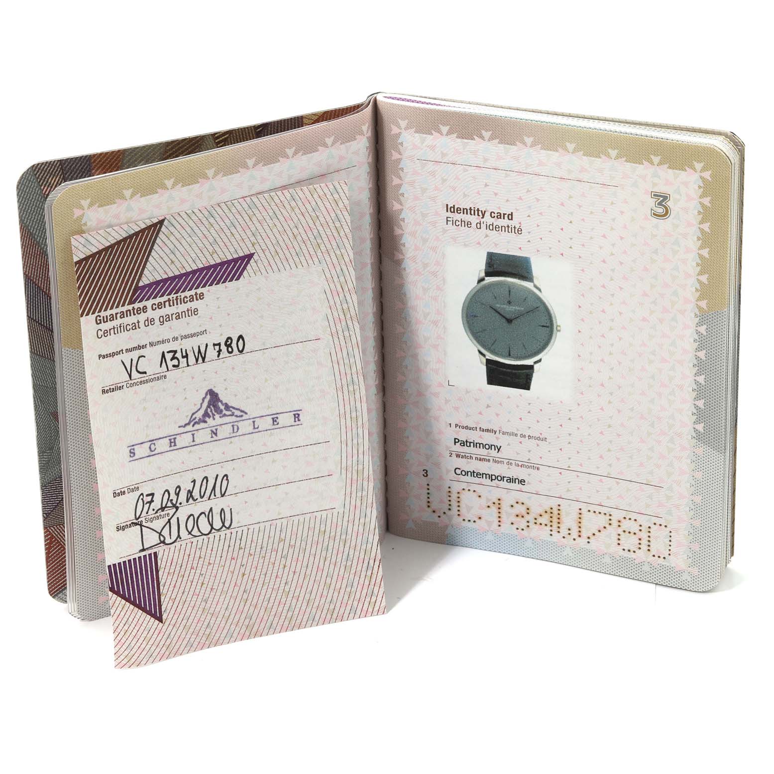 The image shows the guarantee certificate and identity card for a Vacheron Constantin Patrimony 81180/000P-9539 Men's Platinum Grey Dial 81180/000P-9539 Men's Platinum Grey Dial watch.